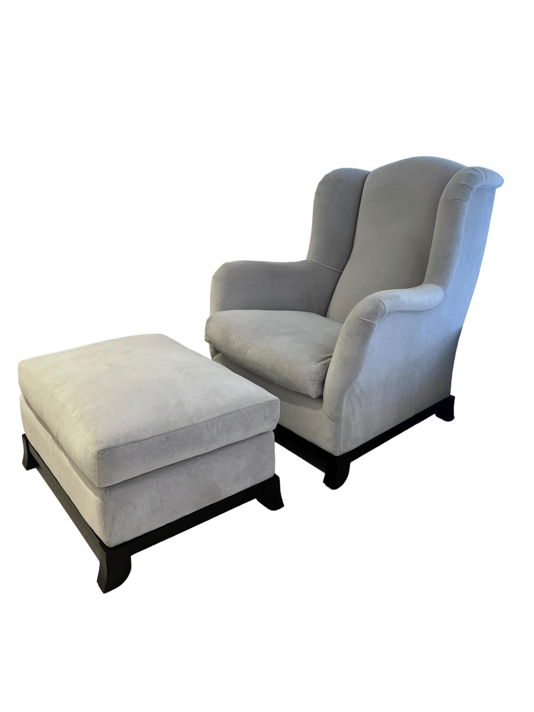 Introducing a captivating ensemble: the Madame A armchair and its perfect complement, a matching pouf (ottoman), harmoniously uniting to complete this remarkable collection. These pieces are enveloped in the luxurious embrace of Holly Hunt's acrylic