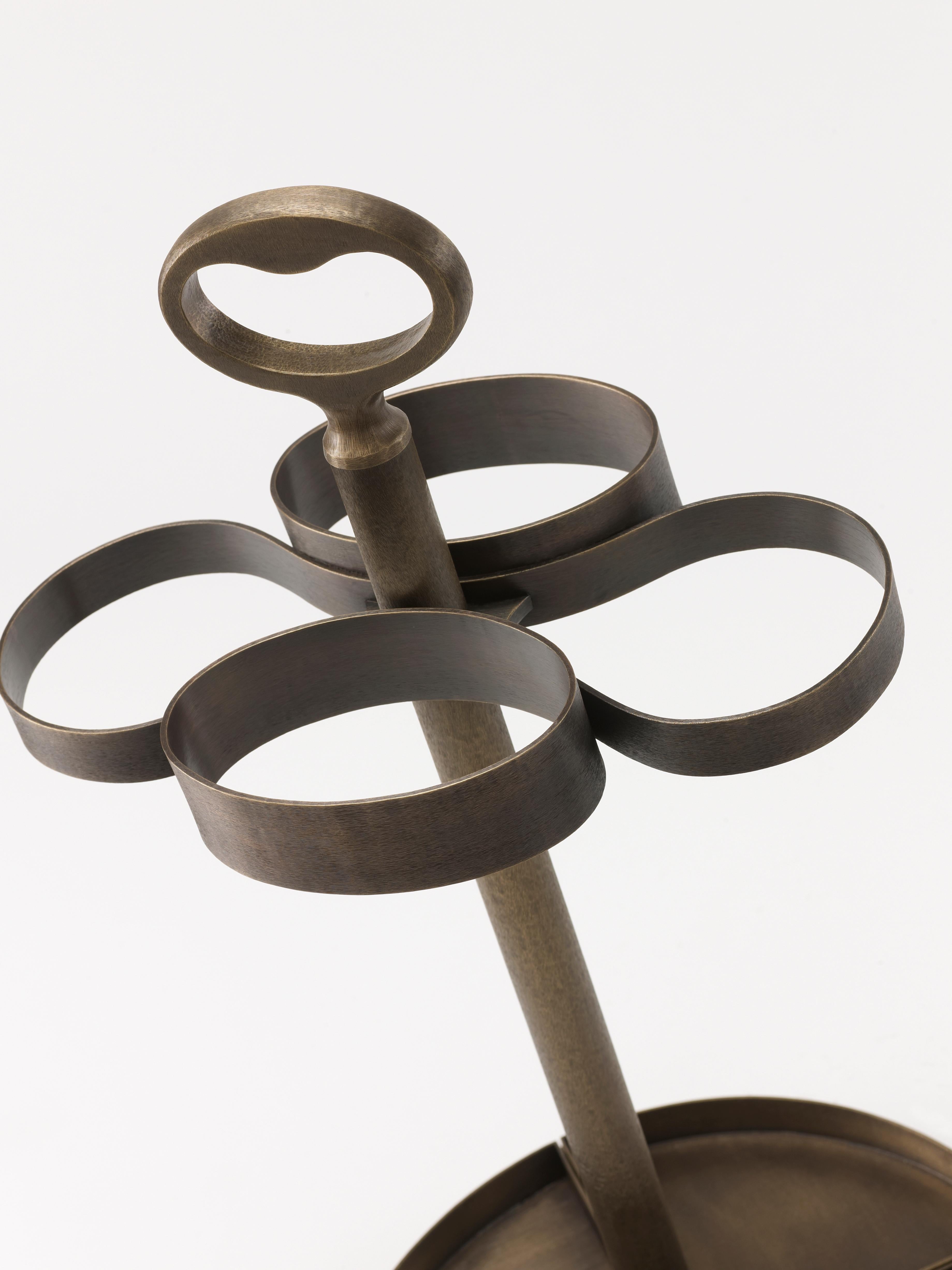 Fred is a hammered bronze umbrella stand with soft shapes and Classic flavour, inspired by the shapes of nature.
            