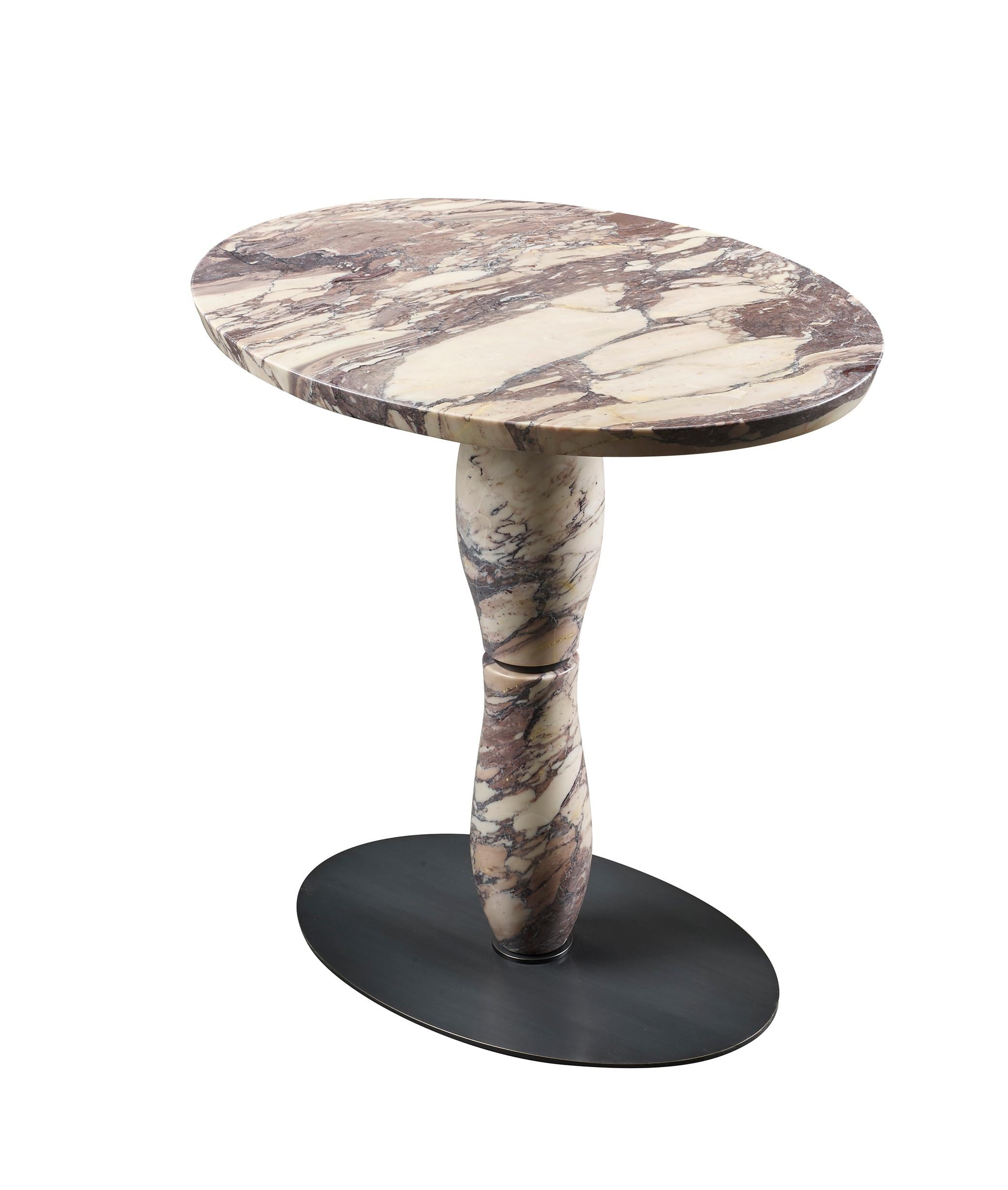 Mediterranée small table belongs to the Capsule collection by Olivier Gagnère, a French designer with an eclectic soul. The table has base in smooth dark bronze, top and leg in Breccia Medicea marble. Also available with top and leg in Nero