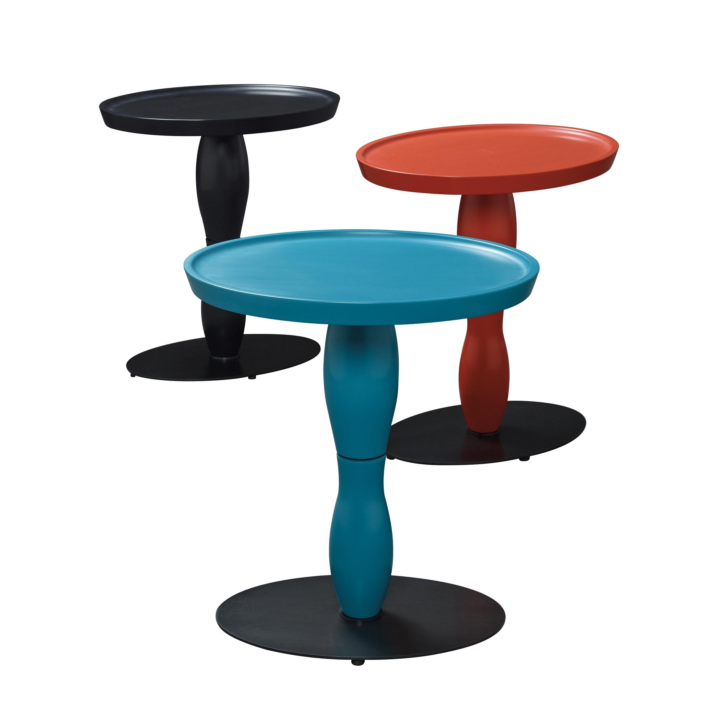 The Mediterranée small table has base in smooth dark bronze, top and leg in semi polished water blue, available with top and leg in semi polished coral red and black.