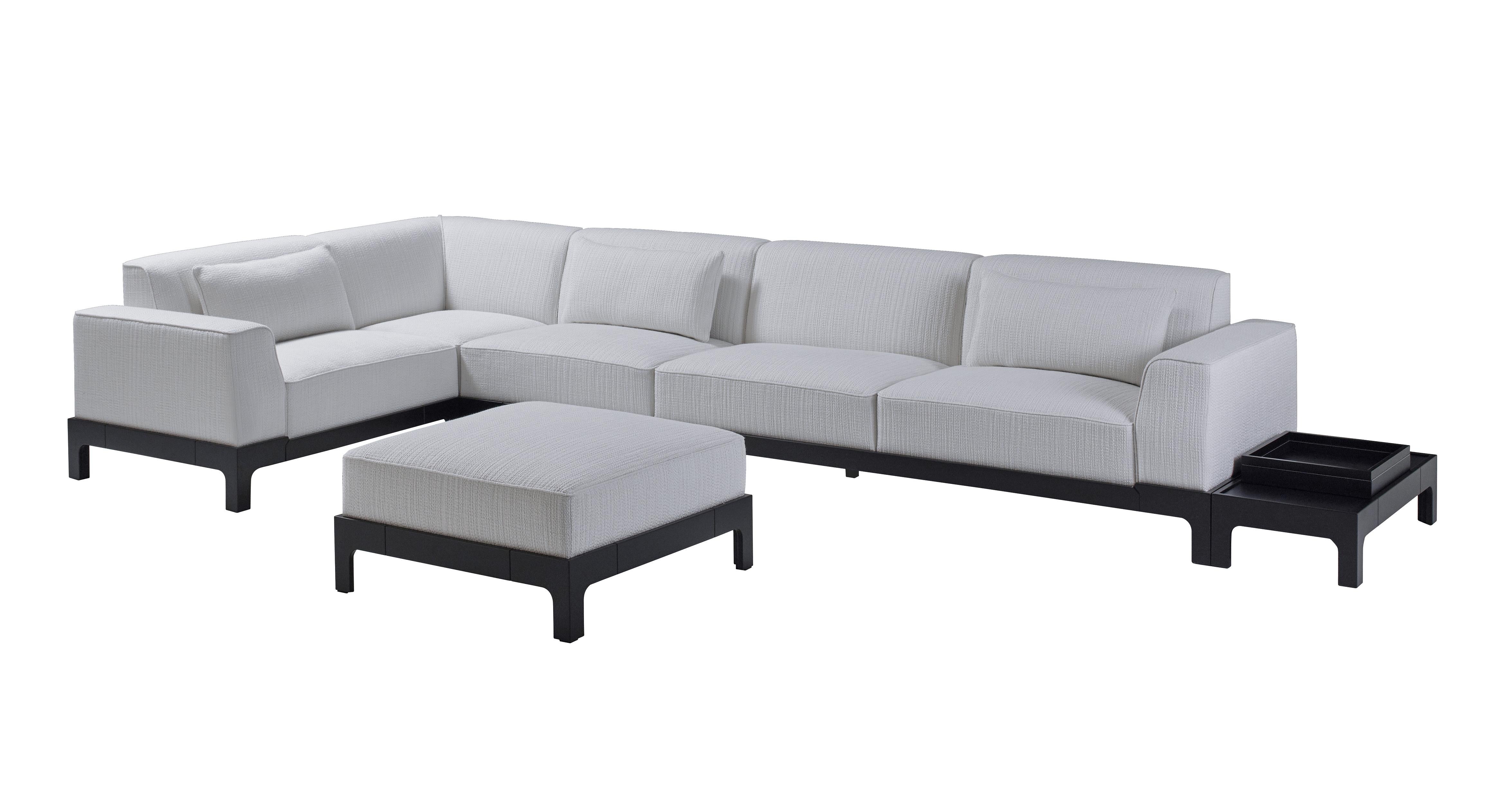 Pullman is a Classic-shaped sofa with a stained blue beech base and a non-removable fabric lining. The cushions are in fabric. The sofa is available also linear. The pouf and the small table complete the design of the Pullman sofa.
            