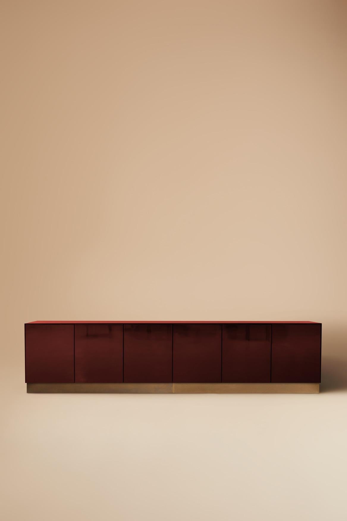 Minimalist Promenade Low Unit Handcrafted in Oxblood High Gloss Steel with Oxidised Brass