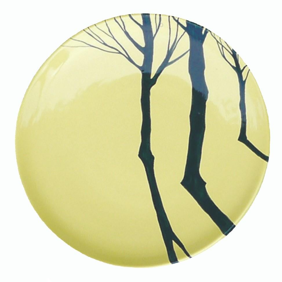 Set of 4 ceramic plates, individually hand painted freehand. Each one features a unique motif of trees and their shadows on a yellow background, making a linear composition. Inspired by nature, these plates have textural depth and beauty of the work
