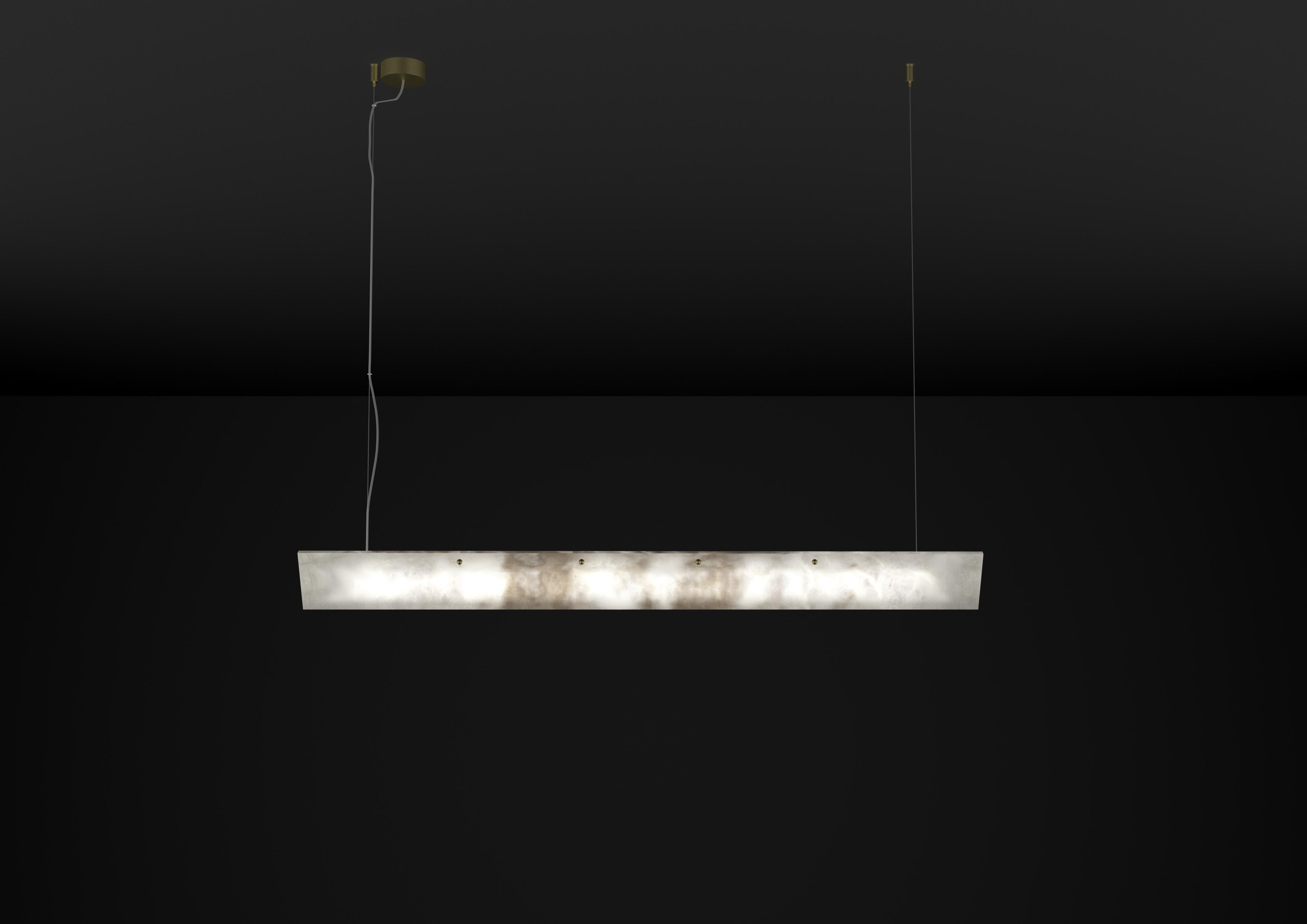 Ade L 1200 Pendant Lamp by Alabastro Italiano
Dimensions: D 10 x W 120 x H 8.5 cm.
Materials: White alabaster and metal.

Available in different finishes: Shiny Silver, Bronze, Brushed Brass, Ruggine of Florence, Brushed Burnished, Shiny Gold,