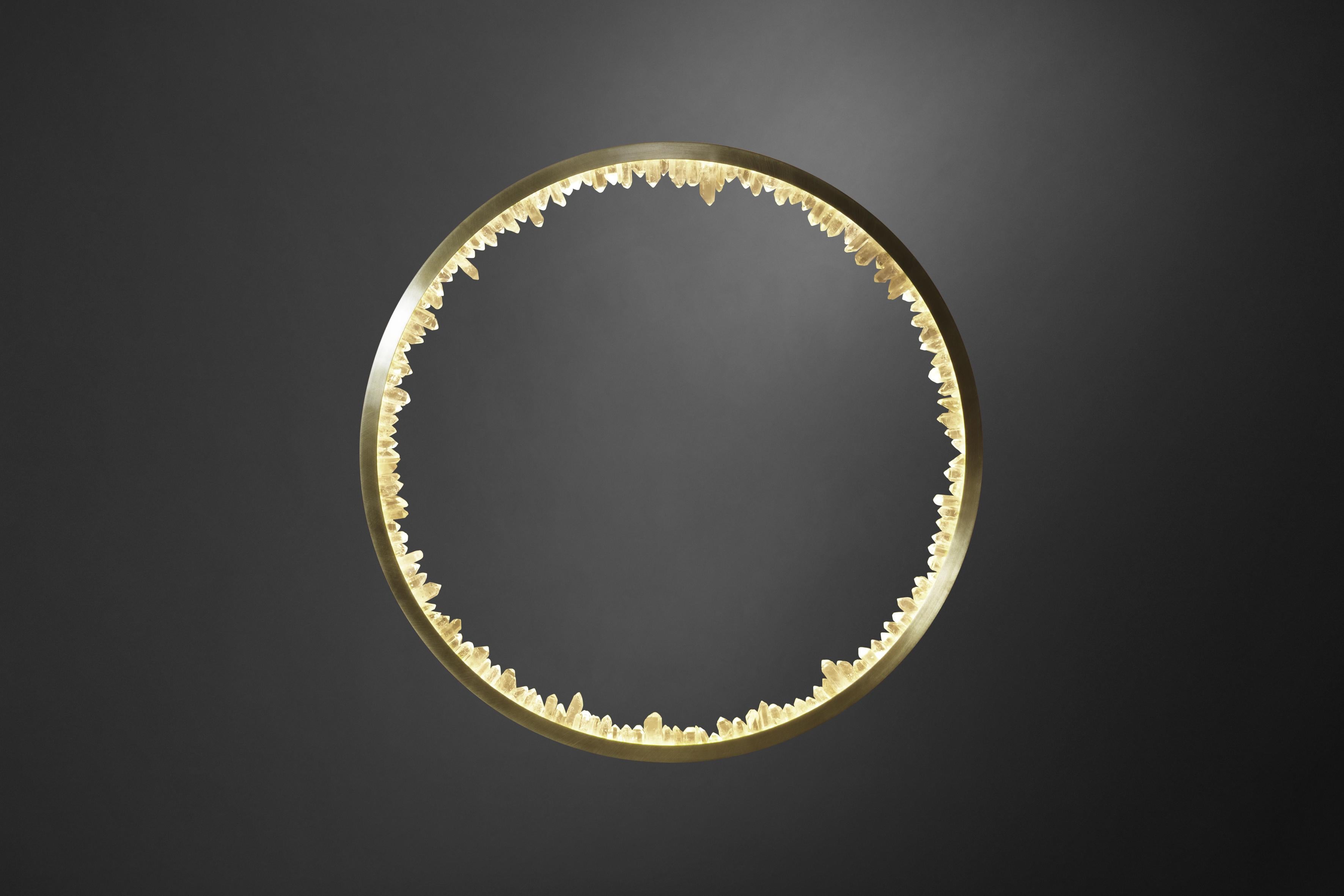 Prometheus IV Sconce by Christopher Boots
Dimensions: D 120 x H 6.5 cm.
Materials: Natural uncut quartz crystals, brass.

Available in other dimensions.
Available in different finishes. Please contact us.

Prometheus stole fire from the Gods of Mt