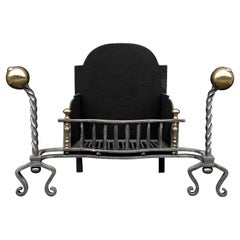 Prominent Mid 19th Century English Polished Wrought Iron Firegrate