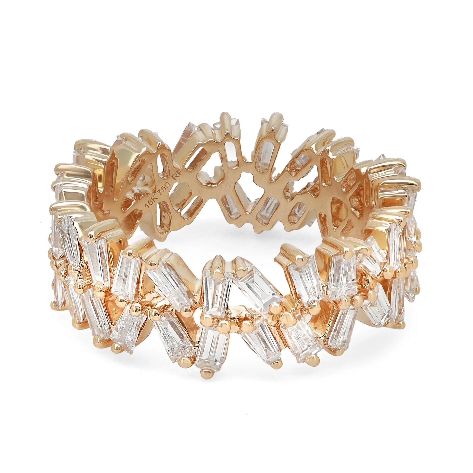 Sparkle away with this 18k yellow gold baguette cut diamond band ring. This ring features 50 prong set sparkling baguette-cut diamonds set all around the ring in a zig-zag pattern. This piece is perfect for a gift or as a promise ring. Super