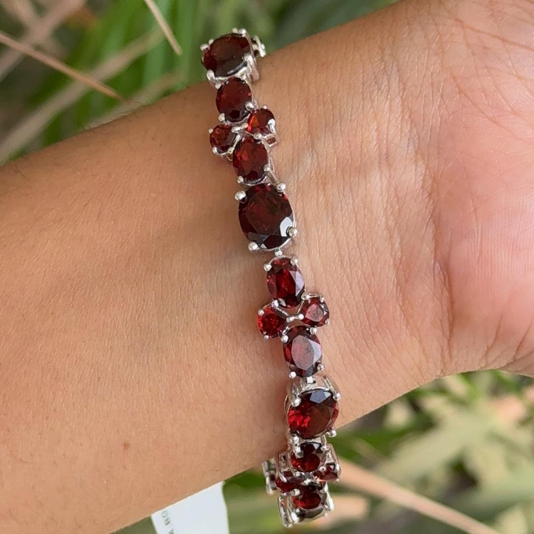 Prong Set Garnet 925 Sterling Silver Gemstone Tennis Bracelet in sterling silver showcases endlessly sparkling natural garnet, weighing 34.8 carat. It measures 7.5 inches long in length.
Natural Garnet stimulate concentration and reduces