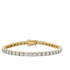 Bracelet tennis en or jaune 14K (ou 18k sur demande) serti de diamants ronds.