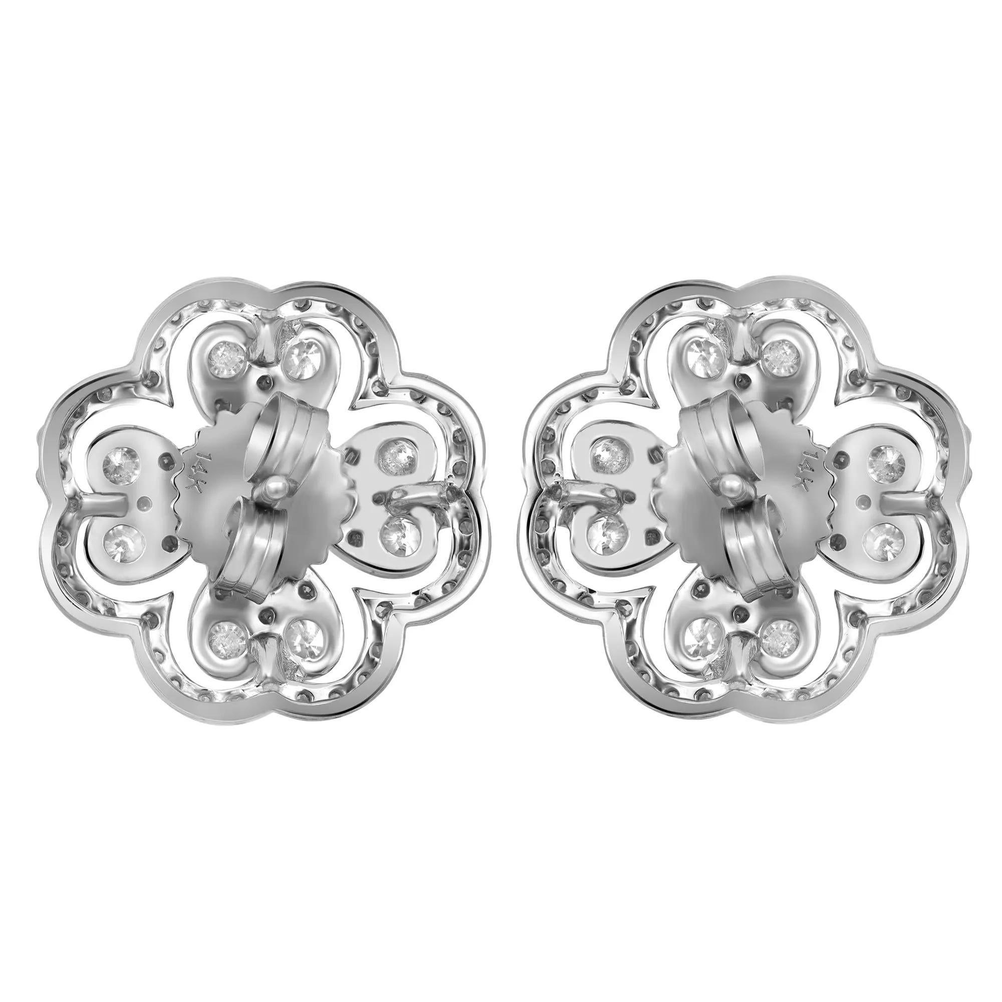These fanciful flowers are reminiscent of springtime blooms. Featuring diamond flower stud earrings crafted in 14k white gold. These earrings are encrusted with prong set round brilliant cut diamonds weighing 2.57 carats. Diamond quality: color G-H