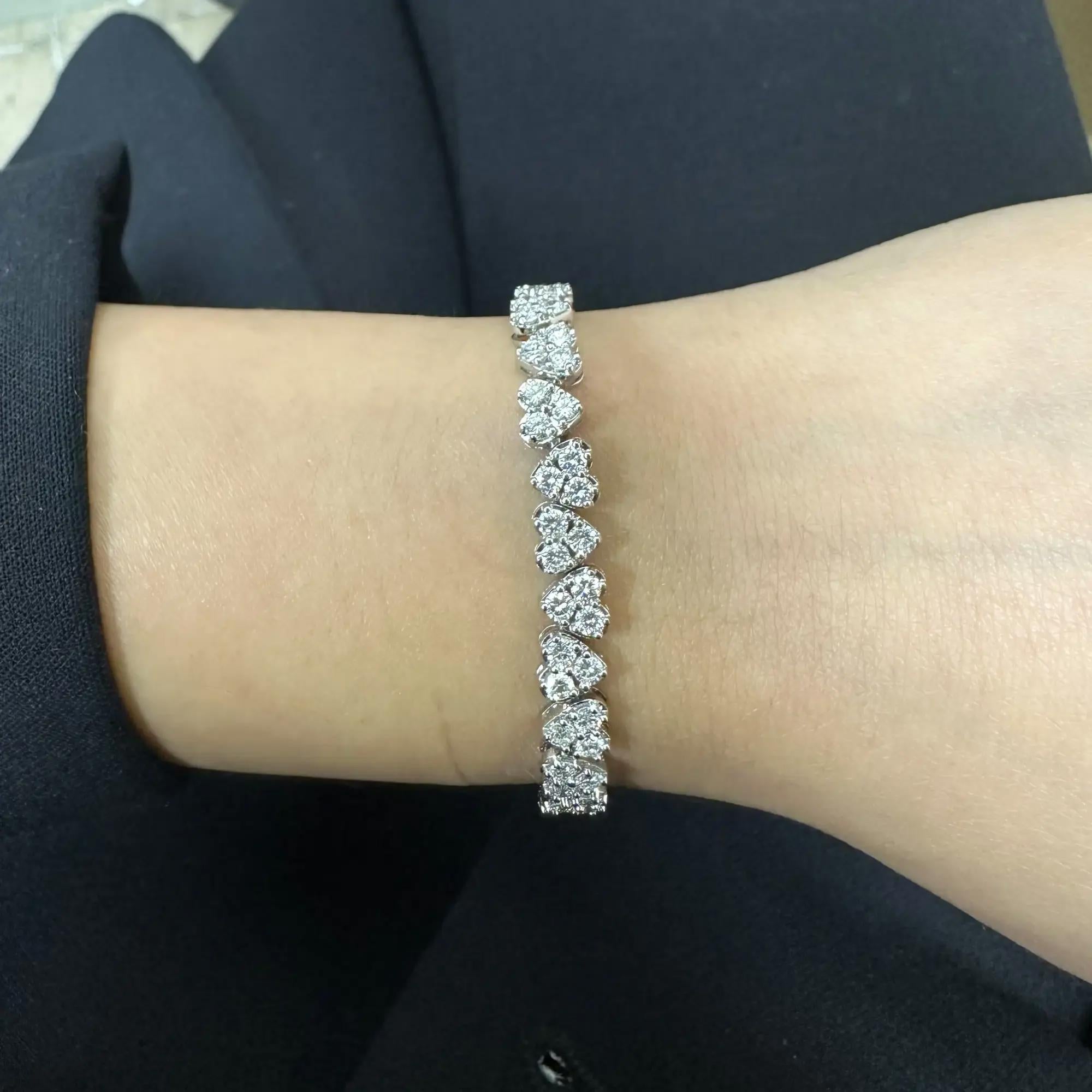 Prong Set Round Cut Diamond Heart Link Tennis Bracelet 18K White Gold 6.48Cttw In New Condition For Sale In New York, NY