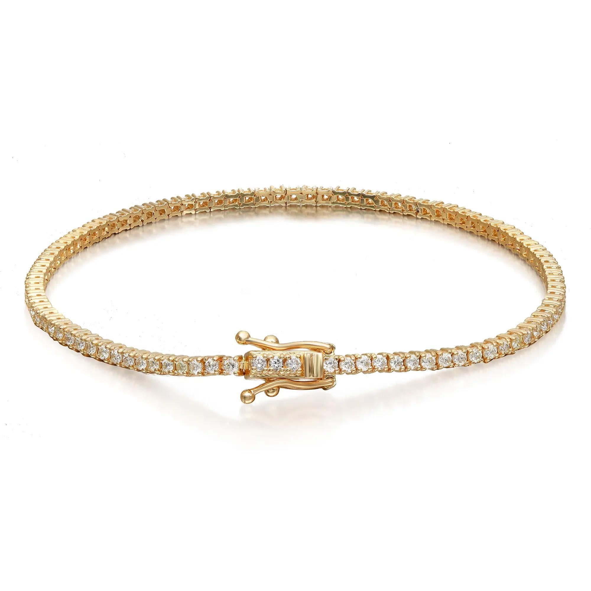 This beautifully crafted Rachel Koen tennis bracelet features prong set round brilliant cut diamonds studded in lustrous 14K yellow gold. Total white diamond weight: 0.95 carat. Diamond Quality: G-H color and VS-SI clarity. Bracelet length: 7
