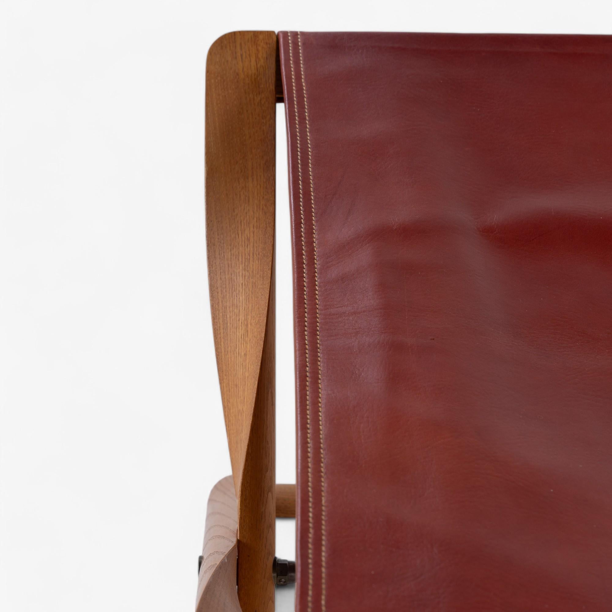 Leather Propeller stool in patinated ash by Kaare Klint For Sale