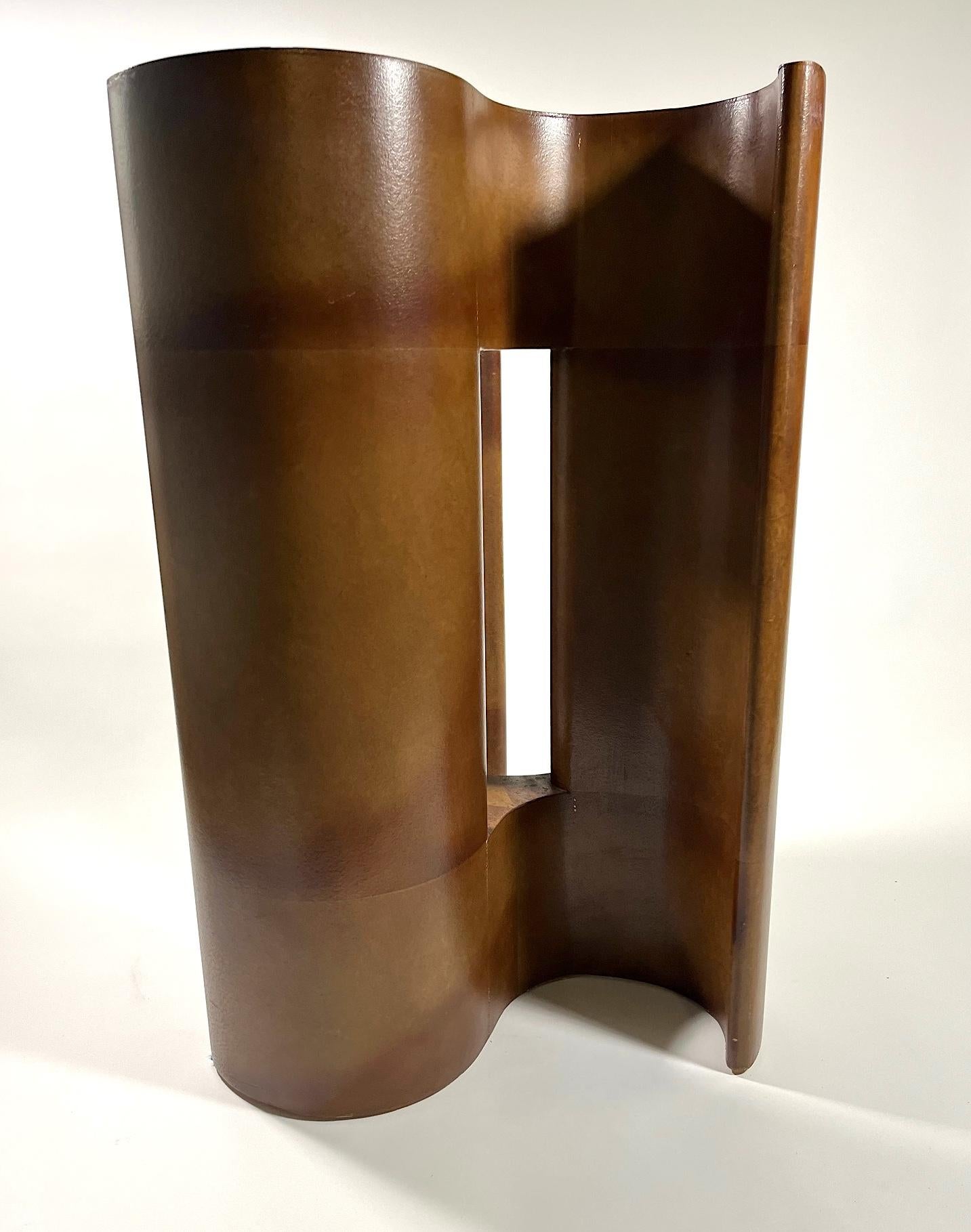 A Pinwheel Occasional Table
Lacquered Wood
After a design by Samuel Marx