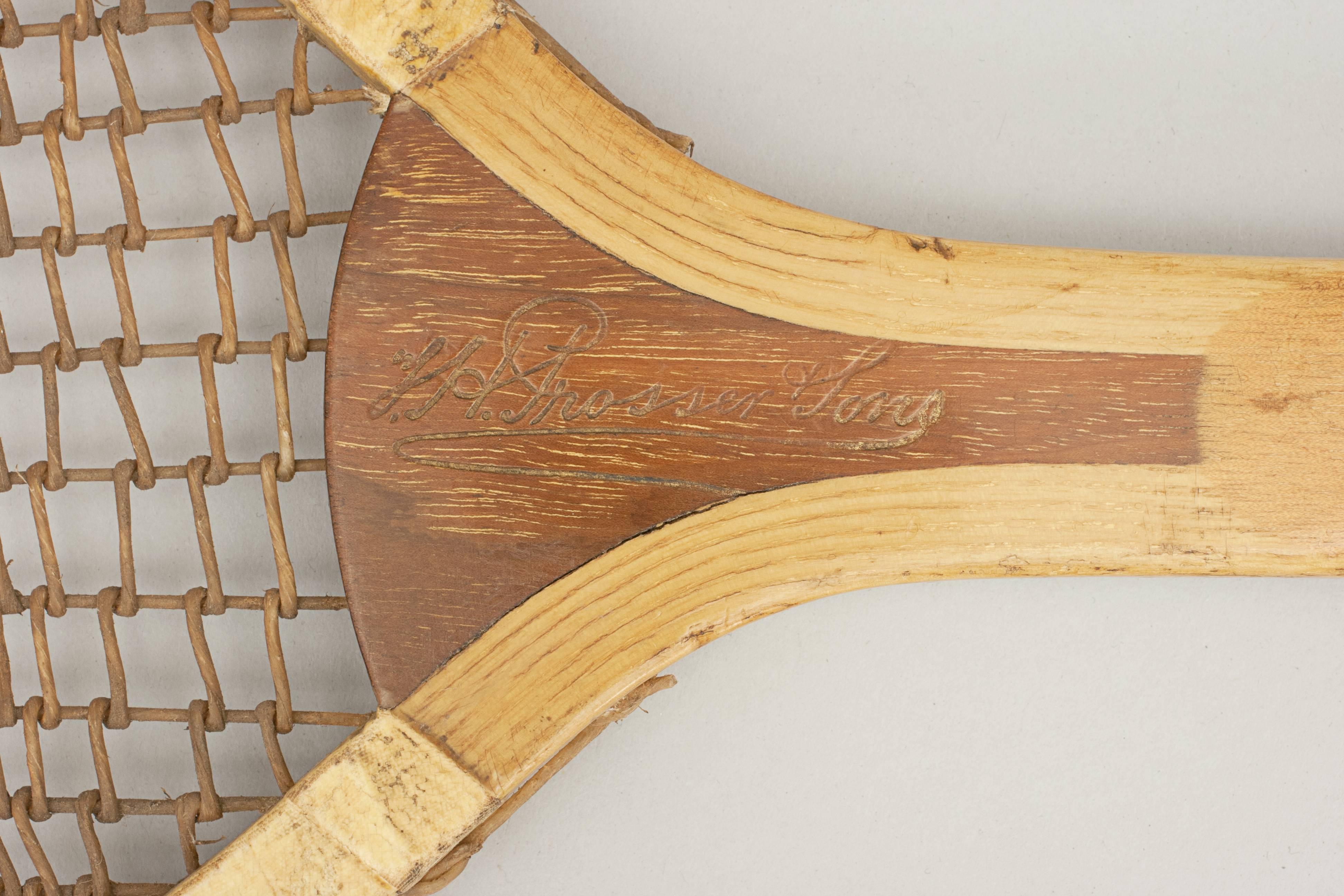 Vintage fish tail lawn tennis racket.
A fine example of a wooden framed lawn tennis racket made by T.H. Prosser & Sons. The racket has a nice clean ash frame with a walnut convex wedge embossed in gilt with 'Gale Barnstaple, T.H. Prosser & Sons'.