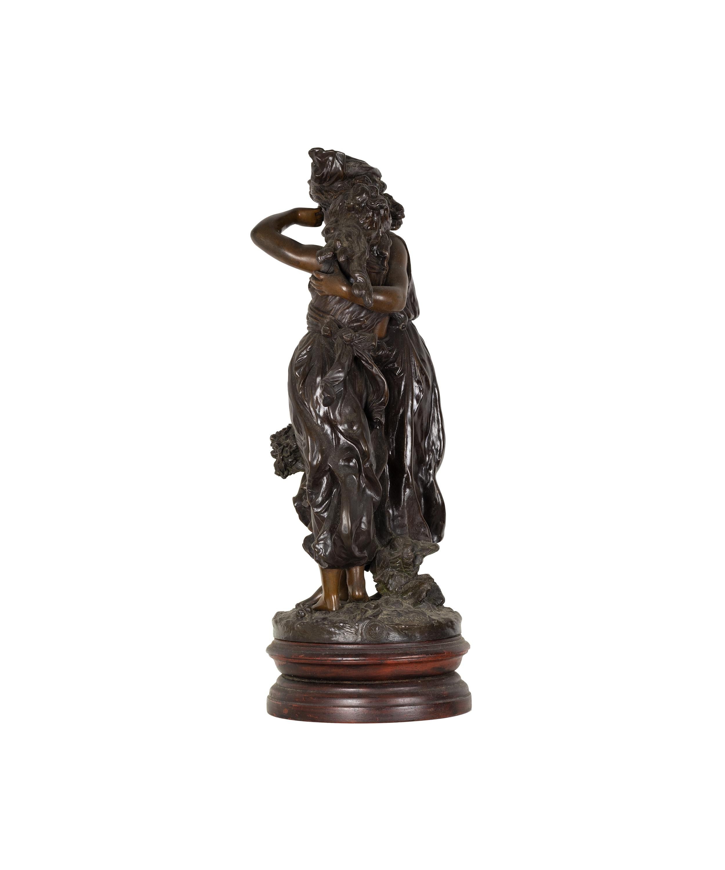 A bronze tabletop sculpture, two girls with the loose tunic in the wind hugging each other - Persephone the Goddess of Protection embraces the smallest girl in an act of protection. 

Possesses a Foundry Seal and ‘H Moreau’ signature. 

Hippolyte