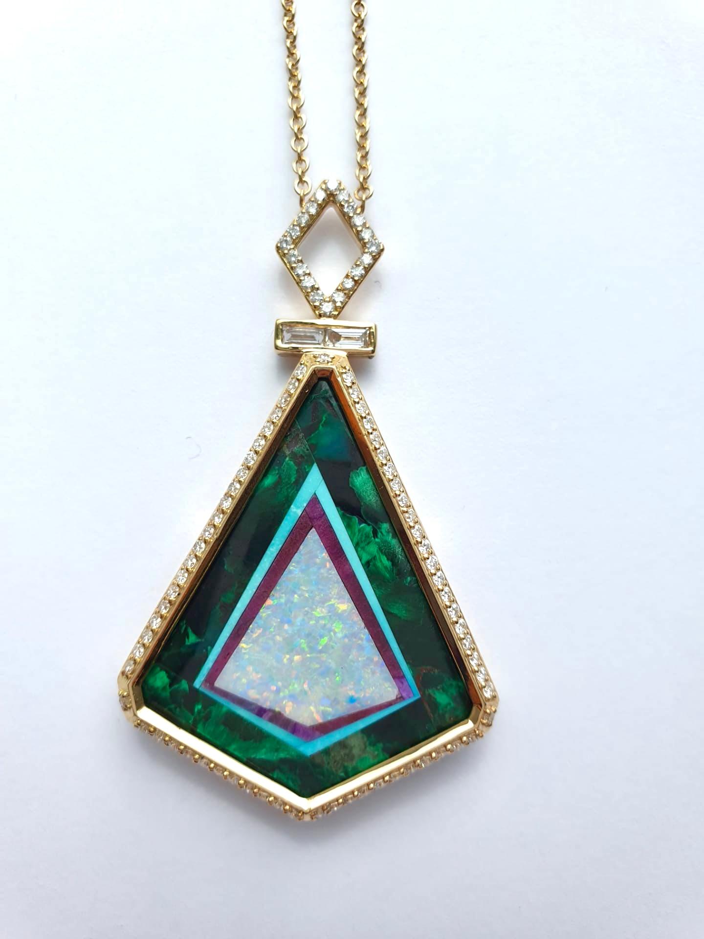 Protection Totem Necklace

18kt yellow gold,Intarsia with malachite, amethyst, opal, turquoise – 0.81ct White Diamonds, 14,39 gr total gold. 
Chain length : 60 cm
Handmade in Italy.
*Due to Covid-19 situation, we may have delivery delays.


You can