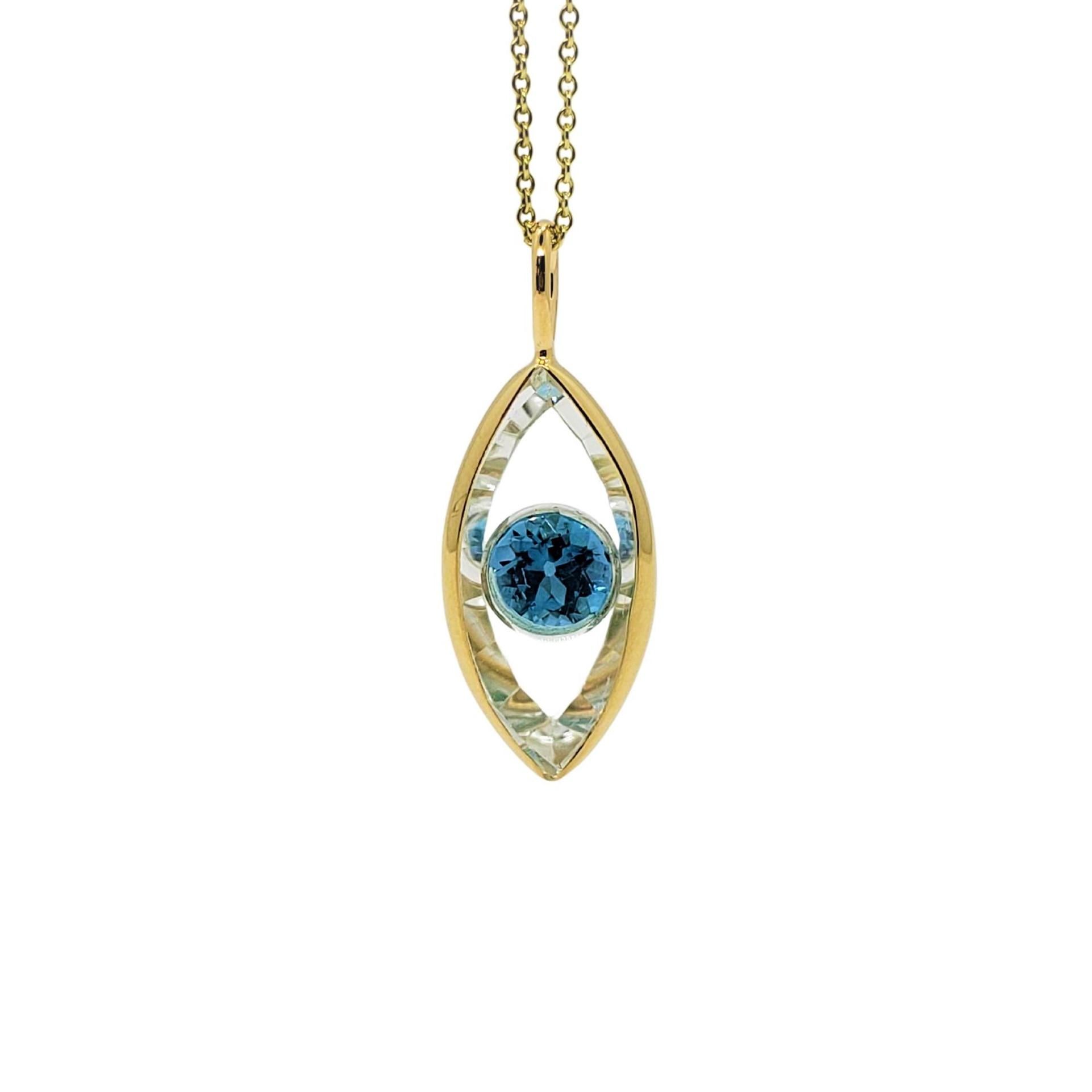 Talisman Necklace in handmade 14K yellow gold bezeled clear quartz marquise shape and either Blue Topaz or Peridot round gemstone center to achieve the look of an eye. There are many iconic amulets and themes that are believed to give protection
