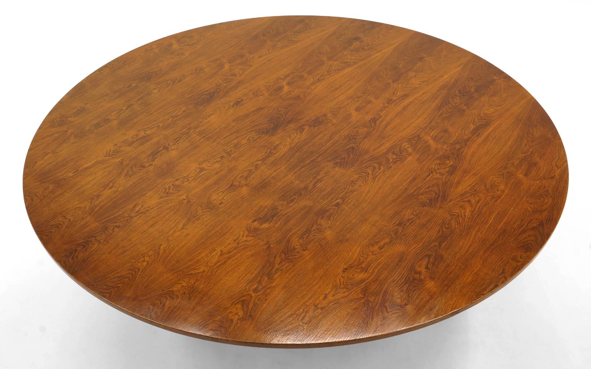This unique prototype table was designed by George Nelson and features a 1.5 inch thick Brazilian rosewood top made from lumber Nelson selected on a trip to Brasilia and meeting with Oscar Niemeyer. It never went into production due to the high cost