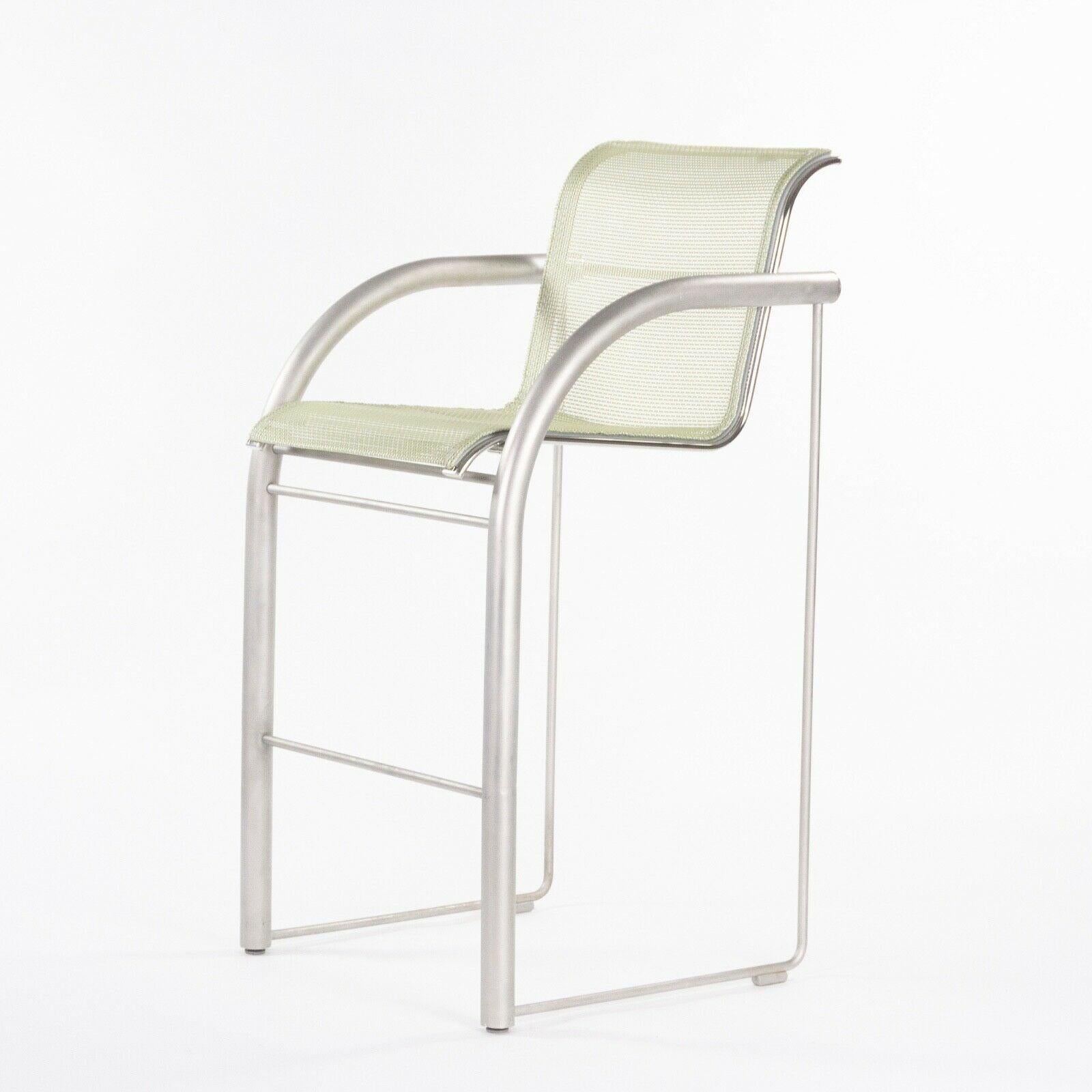 Listed for sale is a Richard Schultz 2002 Collection stainless steel bar stool prototype with outdoor mesh upholstery. For context a 2002 collection bar stool was never put into production, thus, this is a complete one-off. The arm height is 38