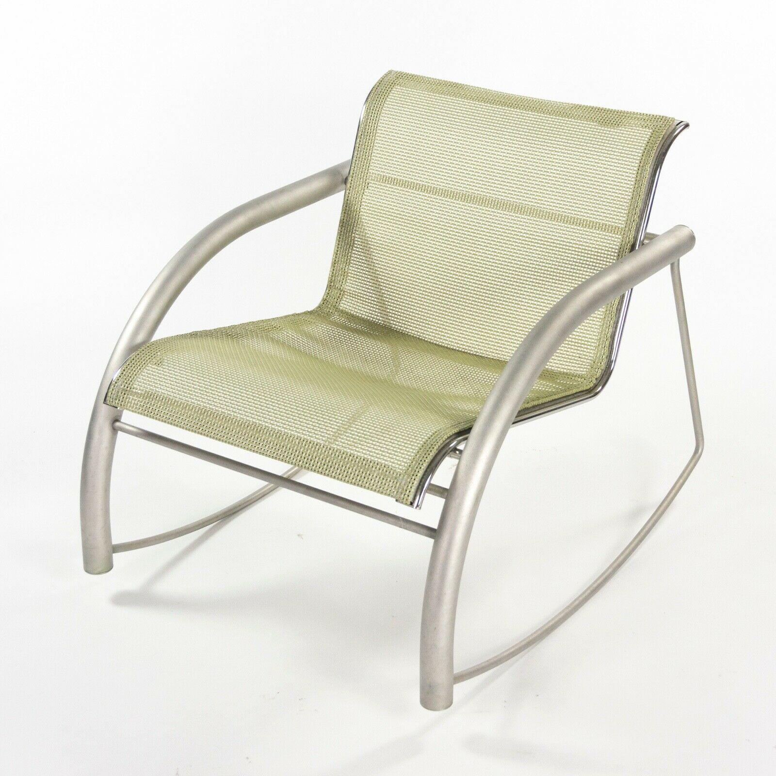 
Listed for sale is a Richard Schultz 2002 Collection stainless steel rocking chair prototype with mesh upholstery. This is a marvelous and rare example of a 2002 collection rocking chair, produced in 2001. The stainless steel frame is in terrific