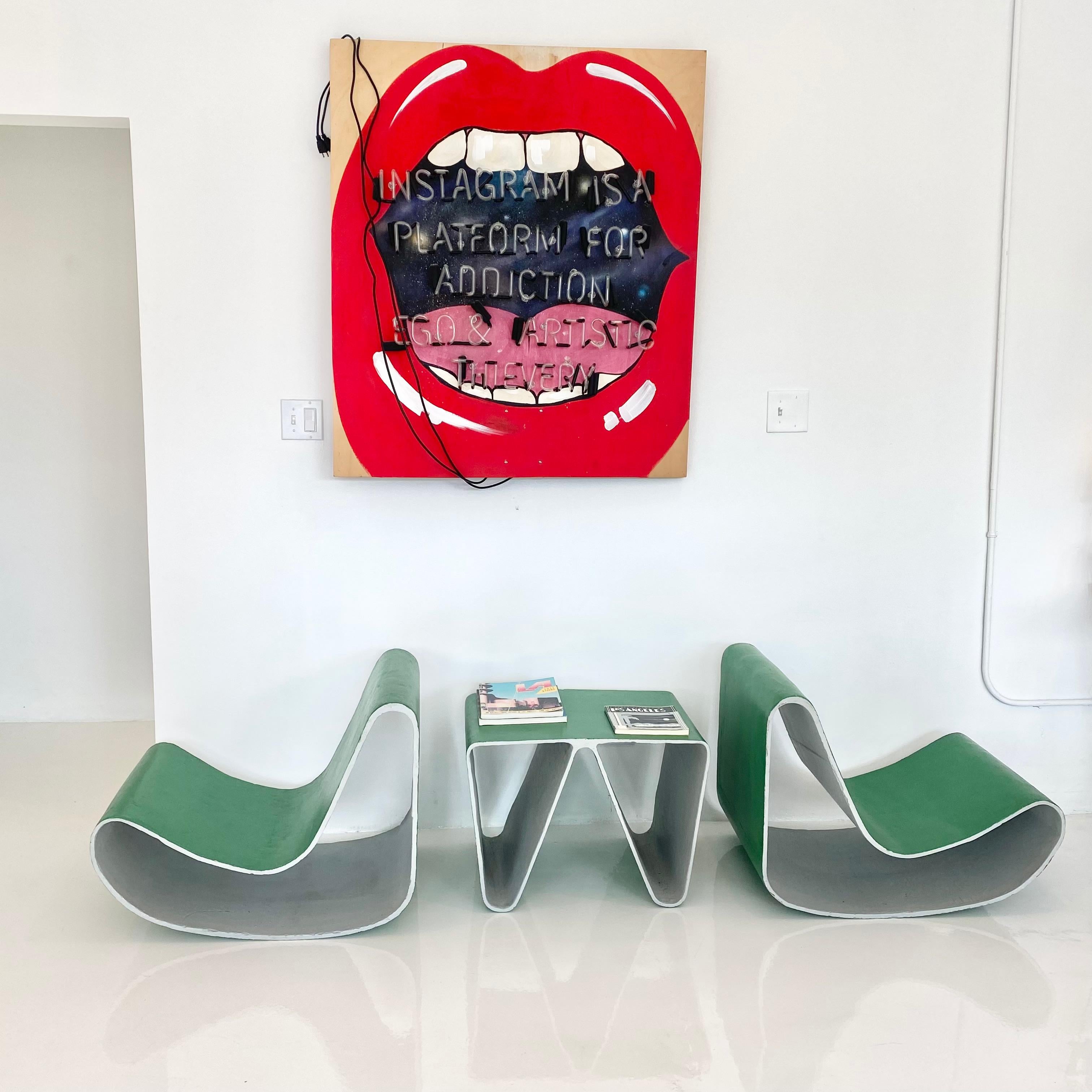 Important set of concrete chairs and matching table. Likely a prototype for the widely known Loop Chairs. Extremely similar shape but more rounded and slightly roomier and more comfortable. Interesting triangular table as well. Painted green and
