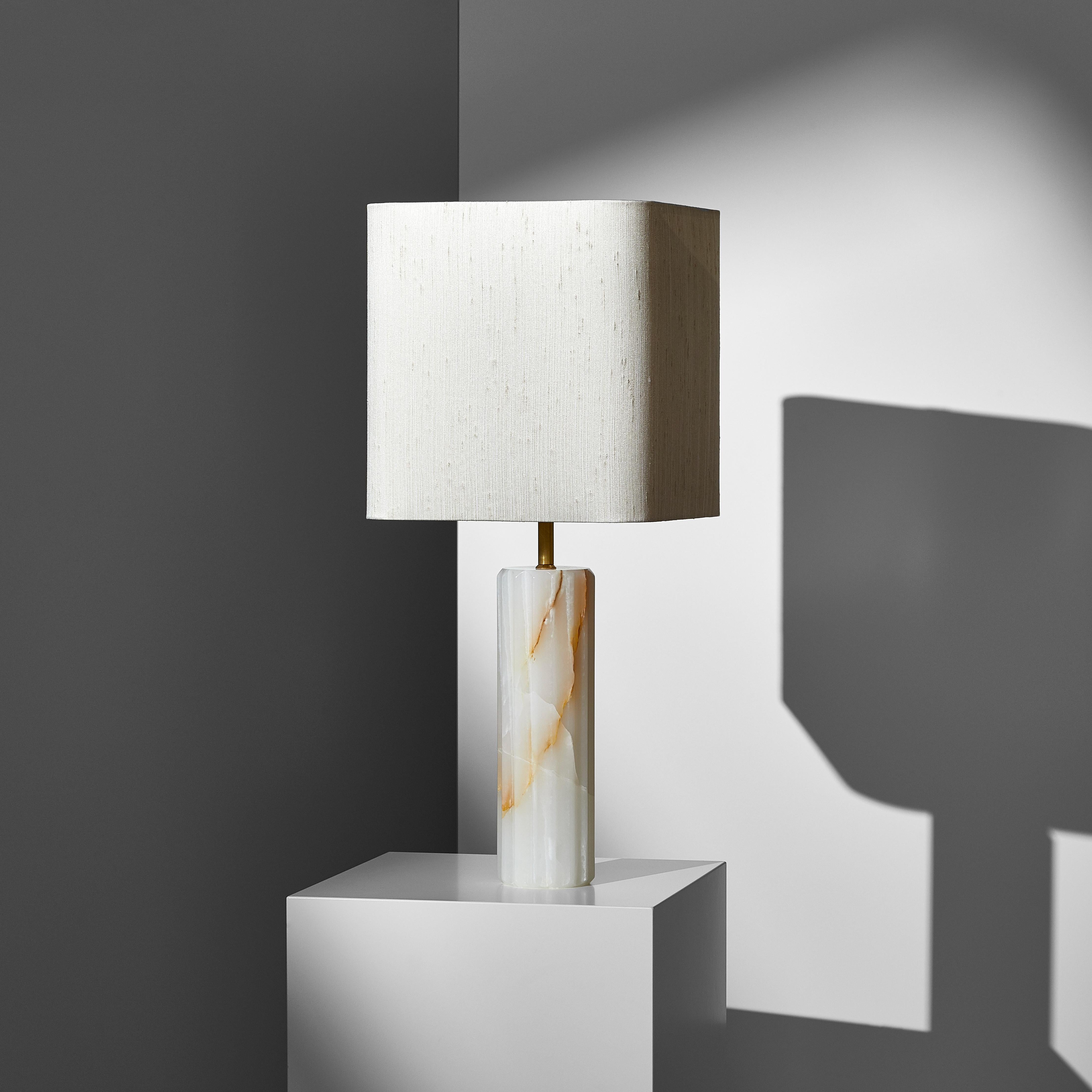Proud Table Lamp by Lisette Rützou
Dimensions: 24 x H 55 cm
Materials: White Onyx

All our lamps can be wired according to each country. If sold to the USA it will be wired for the USA for instance.

 Lisette Rützou’s design is motivated by an