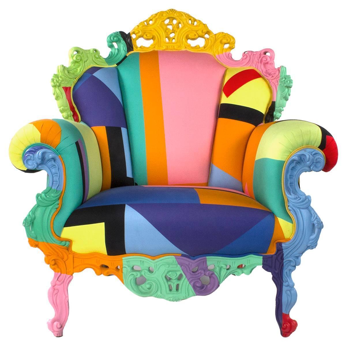 Proust armchair with hand-carved wooden frame by Alessandro Mendini for Cappellini. 

Armchair with wooden frame, upholstered with a new multi-color fabric designed by Alessandro Mendini. Created in 1978 for the Palazzo dei Diamanti in Ferrara,