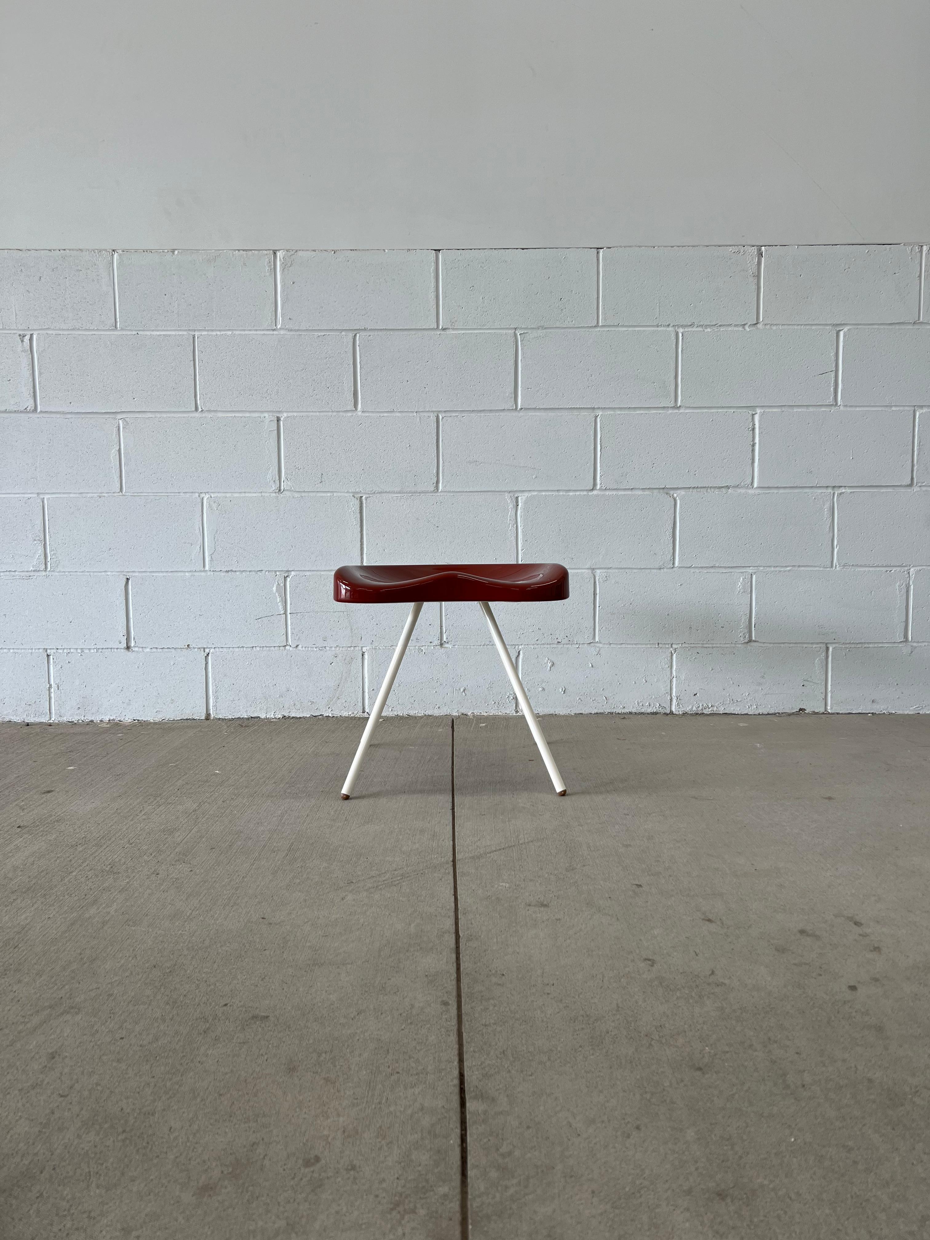 Limited edition Tabouret 307, designed by Jean Prouvé in 1951. Reissued for the Vitra x G Star Raw collaboration in 2011. Limited edition of 200 - 100 in white and basalt, 100 in white and red. This is number 106.