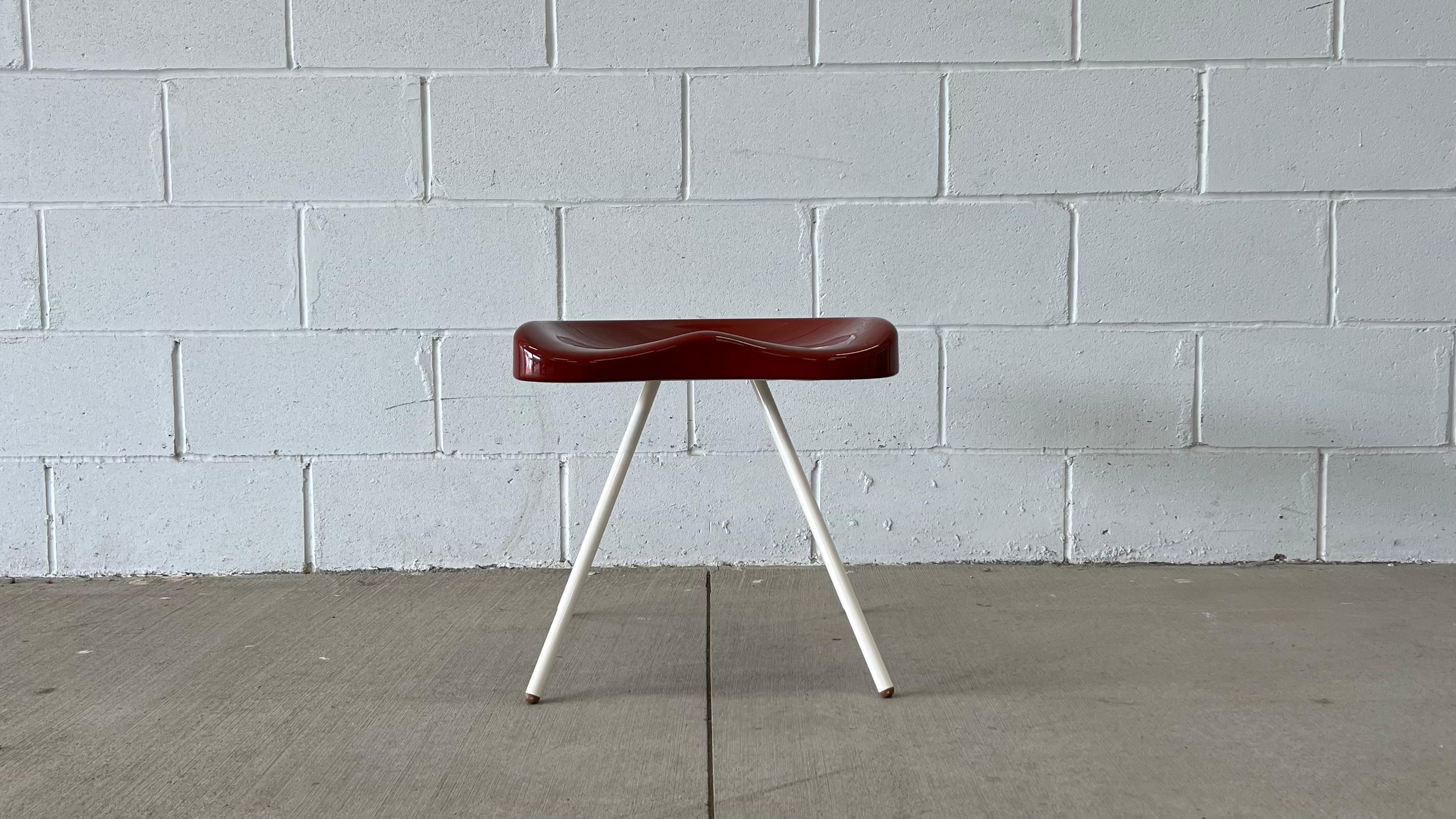 Limited edition Tabouret 307, designed by Jean Prouvé in 1951. Reissued for the Vitra x G Star Raw collaboration in 2011. Limited edition of 200 - 100 in white and basalt, 100 in white and red. This is number 106.