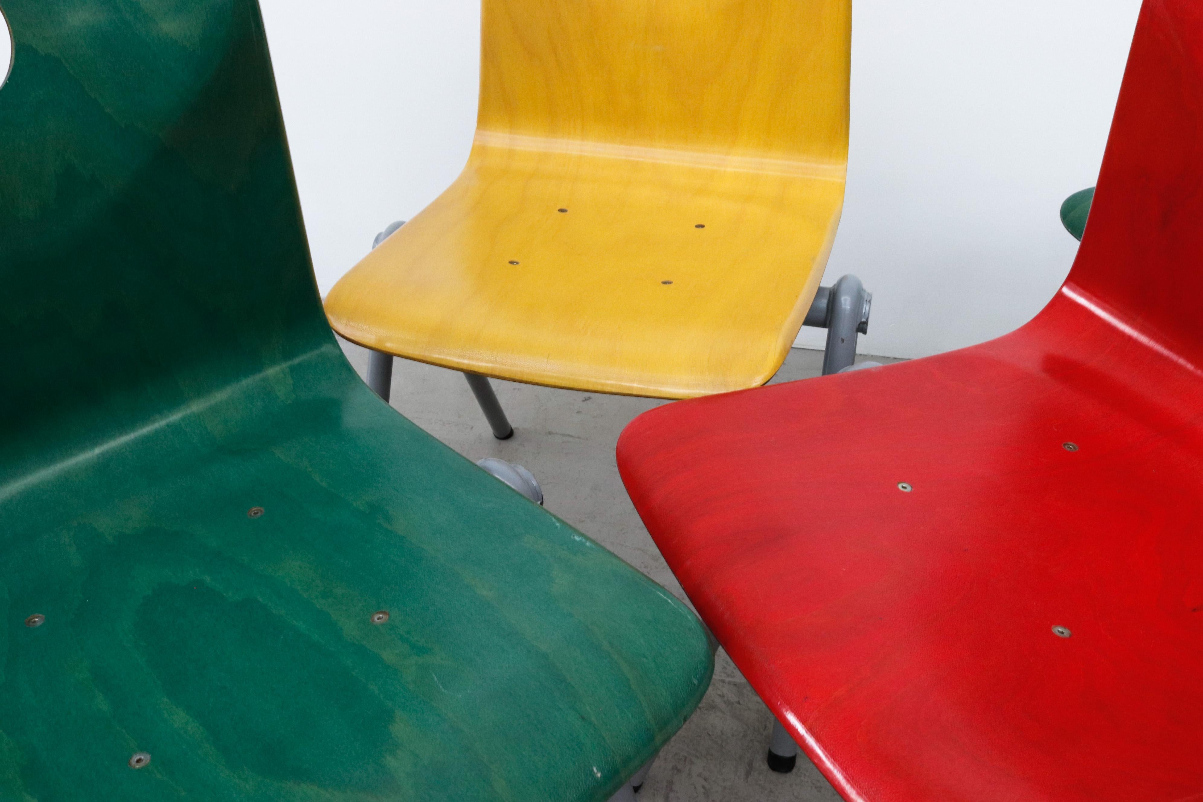 Multi-Colored Stacking Chairs with Circle Cut out 2