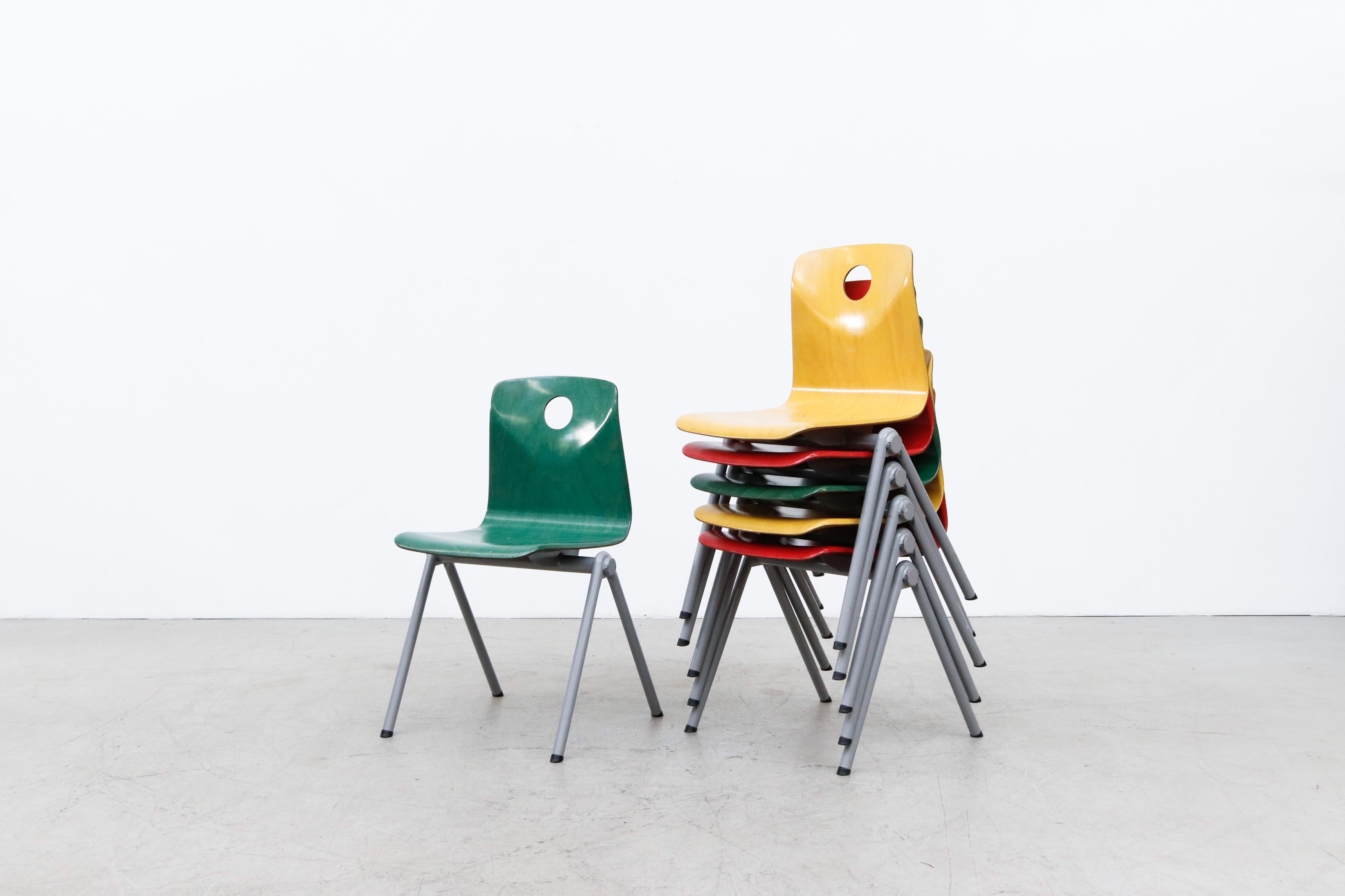 Mid-Century Modern Multi-Colored Stacking Chairs with Circle Cut out