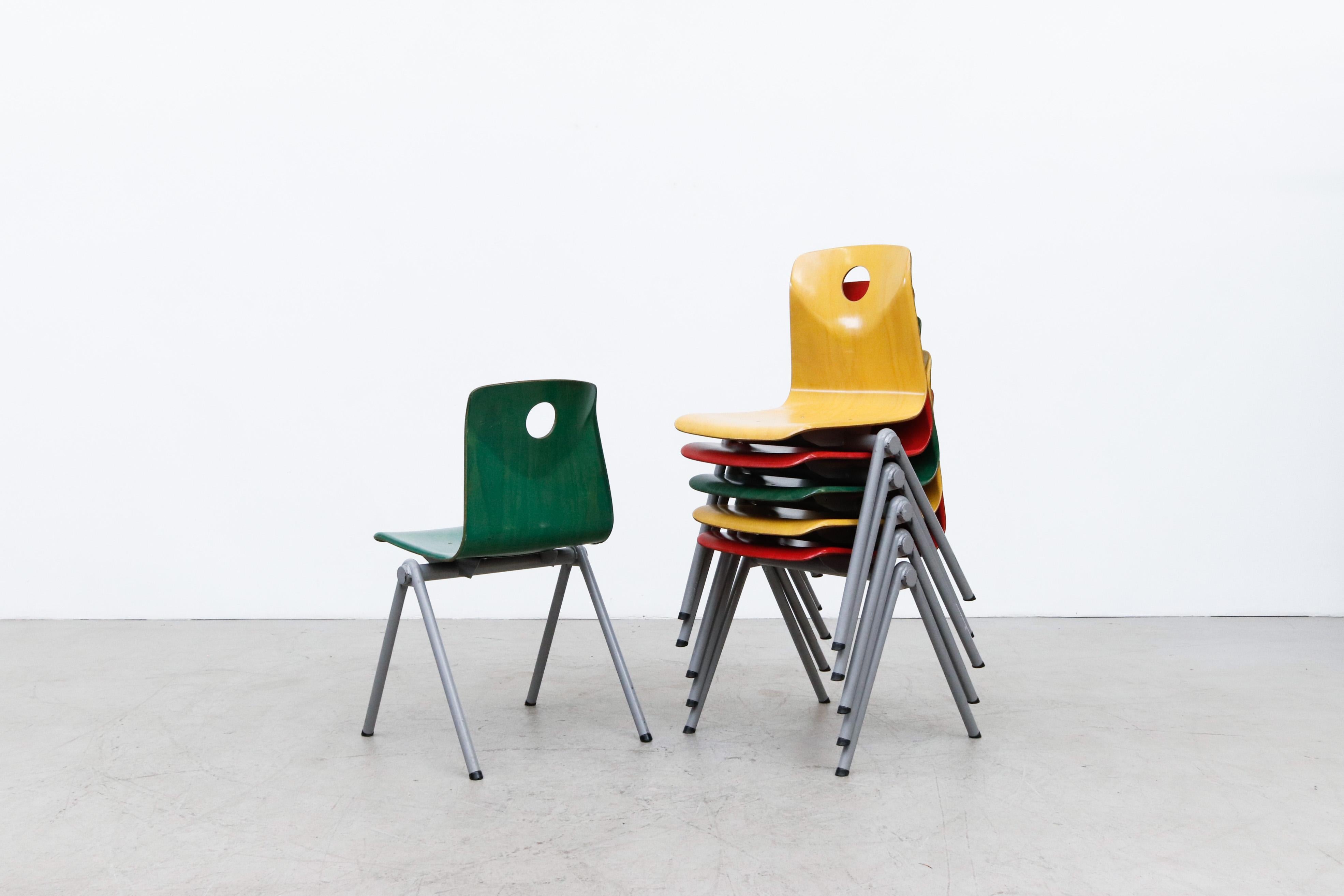 Enameled Multi-Colored Stacking Chairs with Circle Cut out