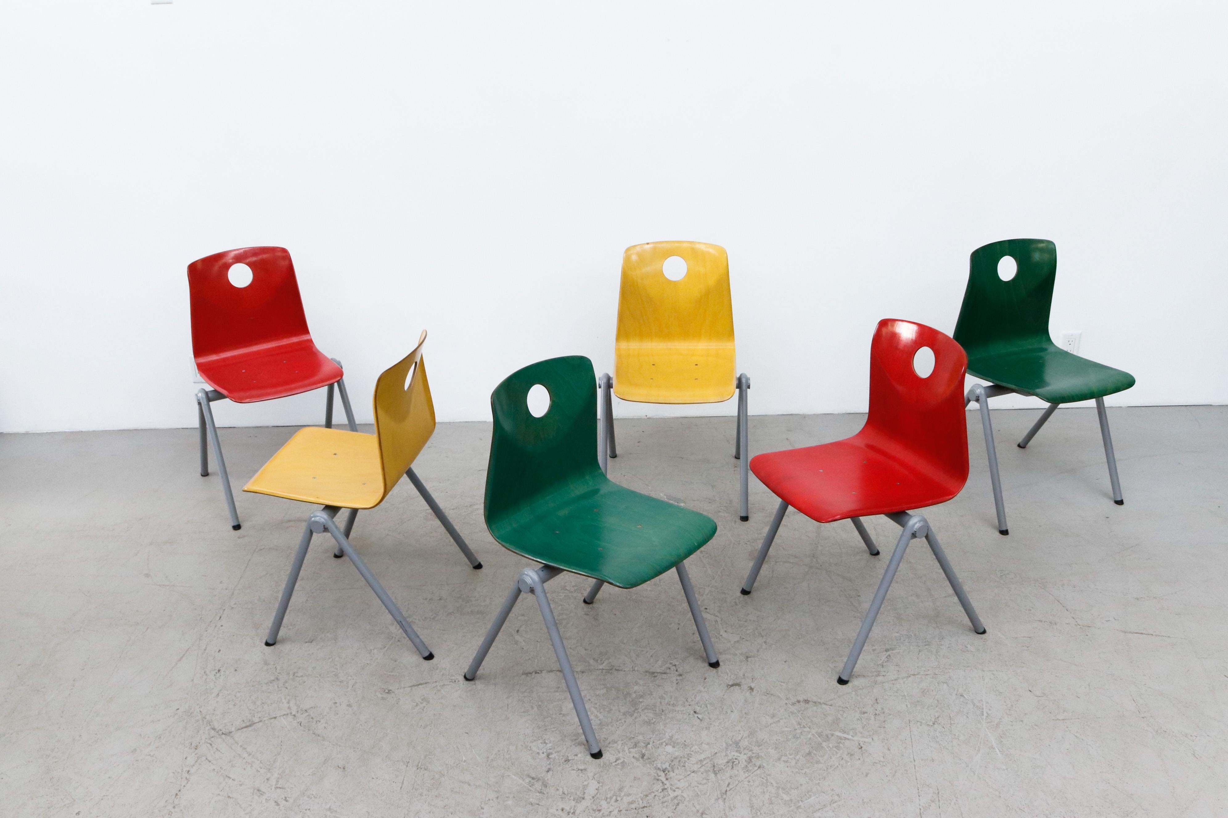Late 20th Century Multi-Colored Stacking Chairs with Circle Cut out