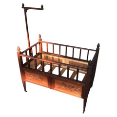 Provençal child's bed in carved wood