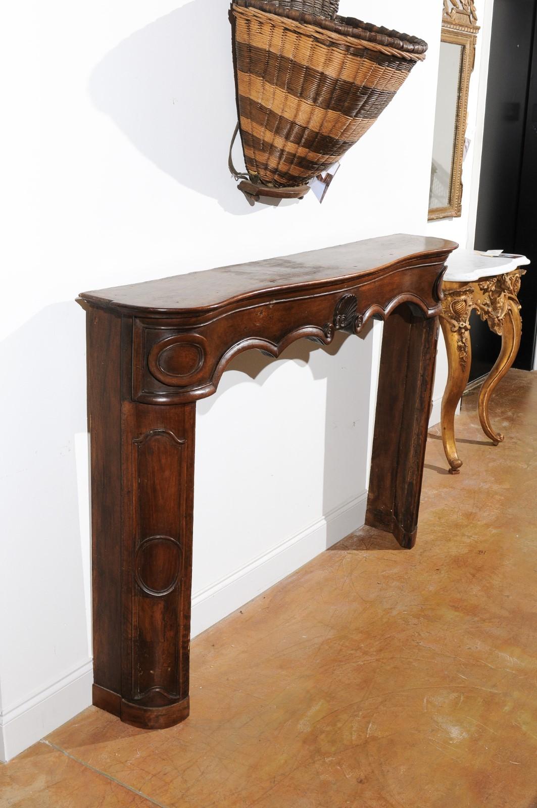 Provençal Louis XV Period 18th Century Walnut Fireplace Mantel with Carved Shell For Sale 1