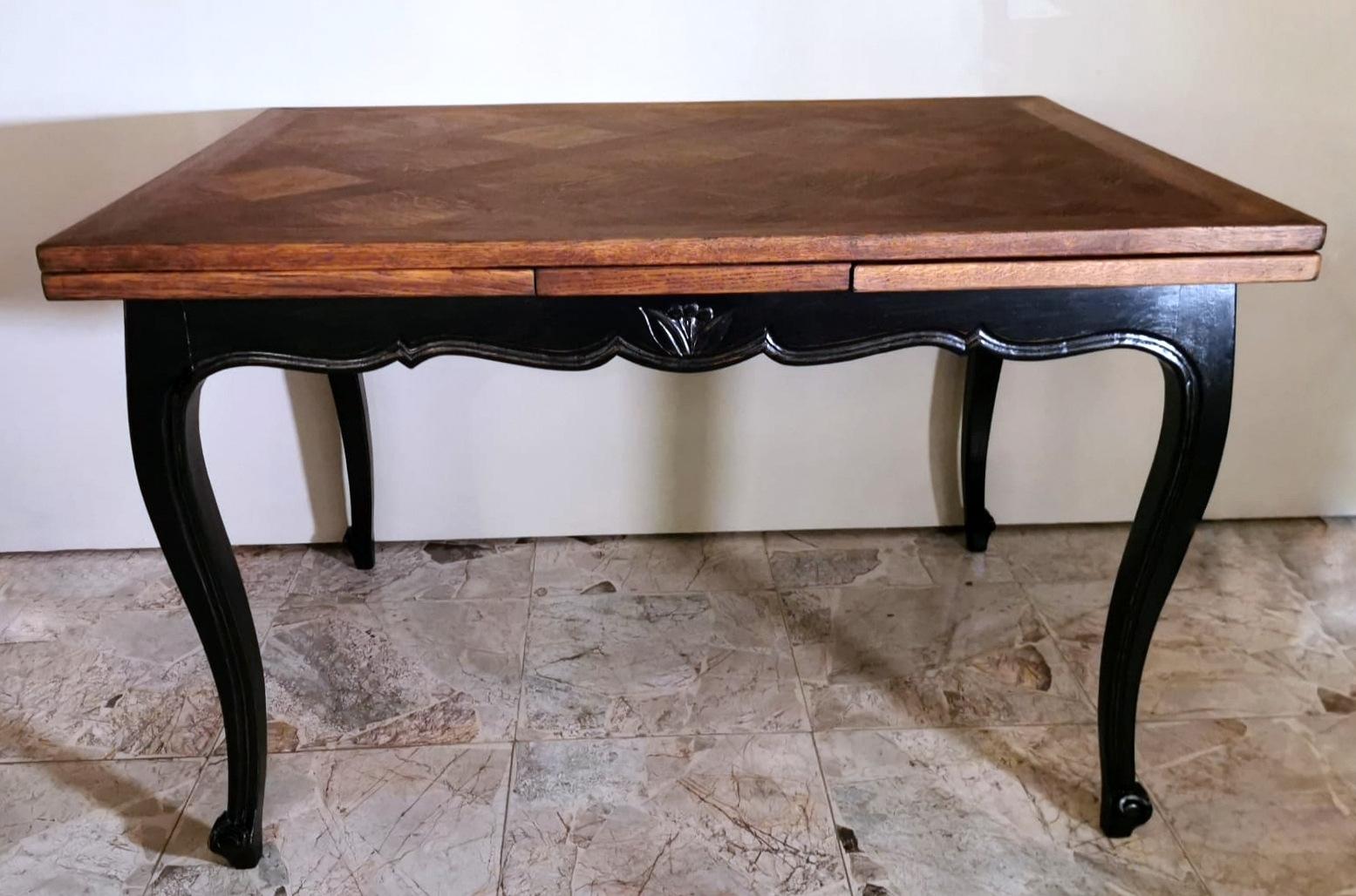 We kindly suggest that you read the whole description, as with it we try to give you detailed technical and historical information to ensure the authenticity of our items. French extending table in Provencal style made of oak wood; the top has a