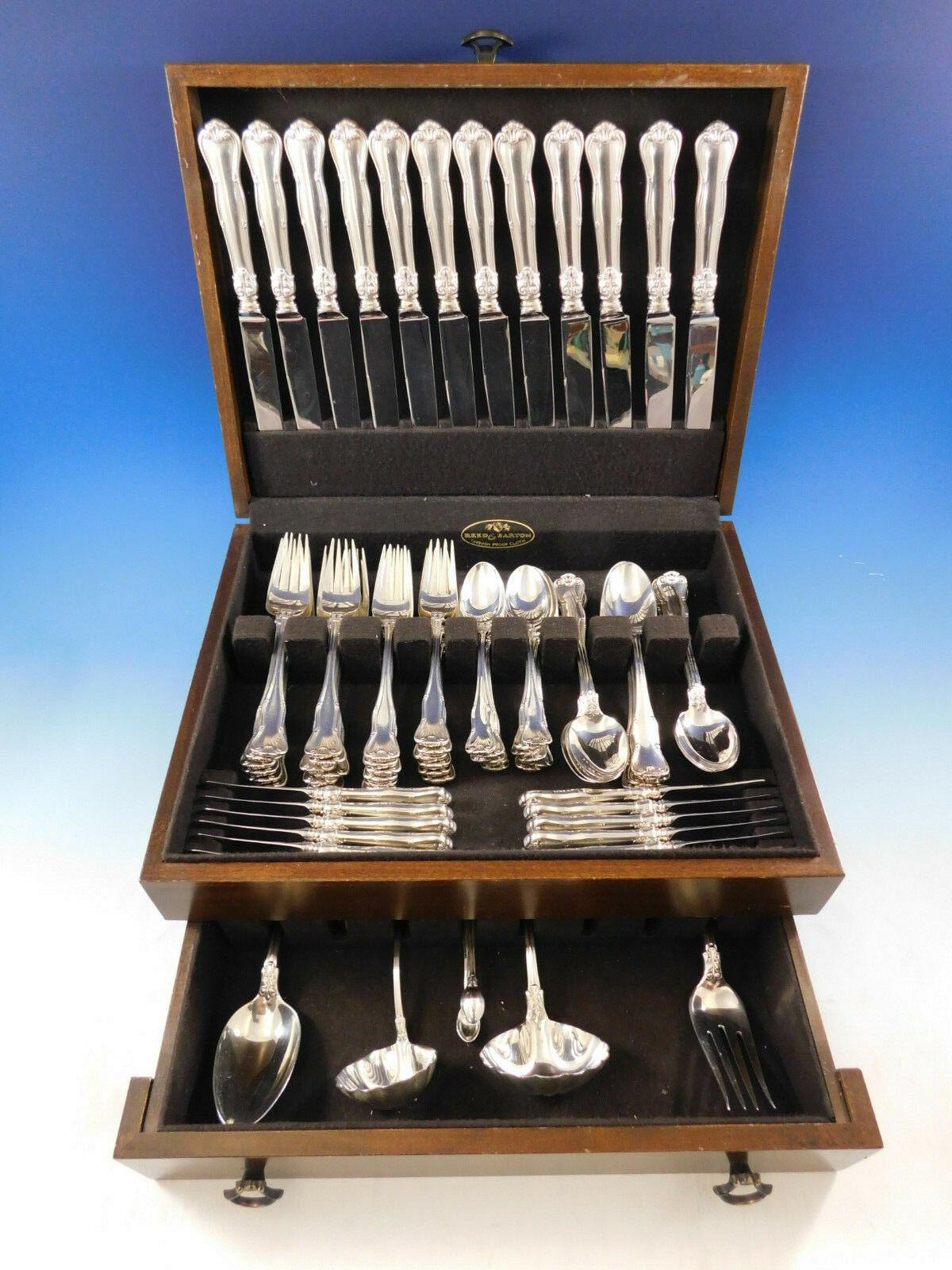 Dinner size Provence by Tiffany & Co. sterling silver flatware set of 77 pieces. This set includes:

12 dinner size knives, 9 7/8