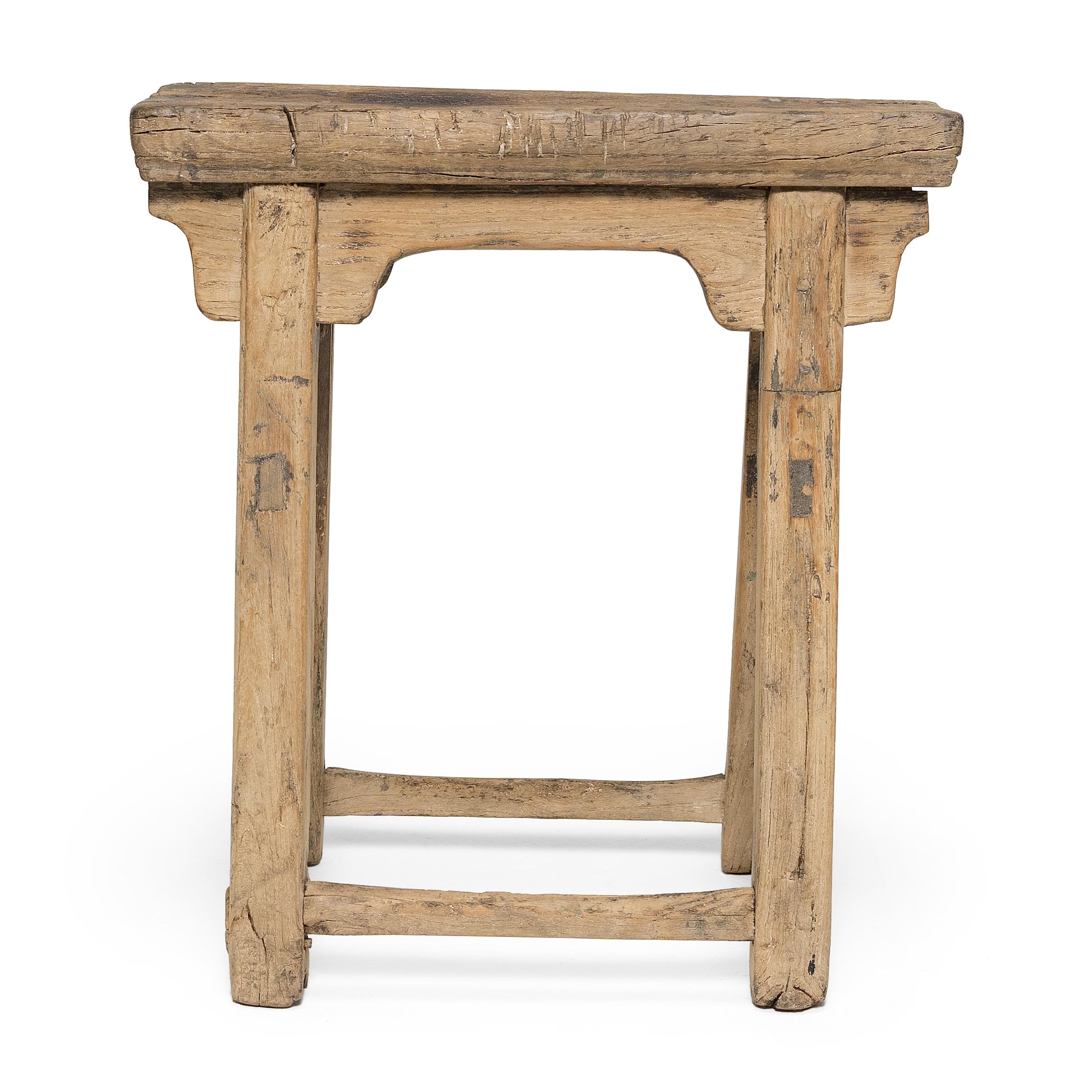 More portable than chairs, stools were a versatile seating option for Qing-dynasty scholars, nobles, and peasants alike. This provincial stool dates to the turn of the century and would have been used throughout a courtyard home as versatile