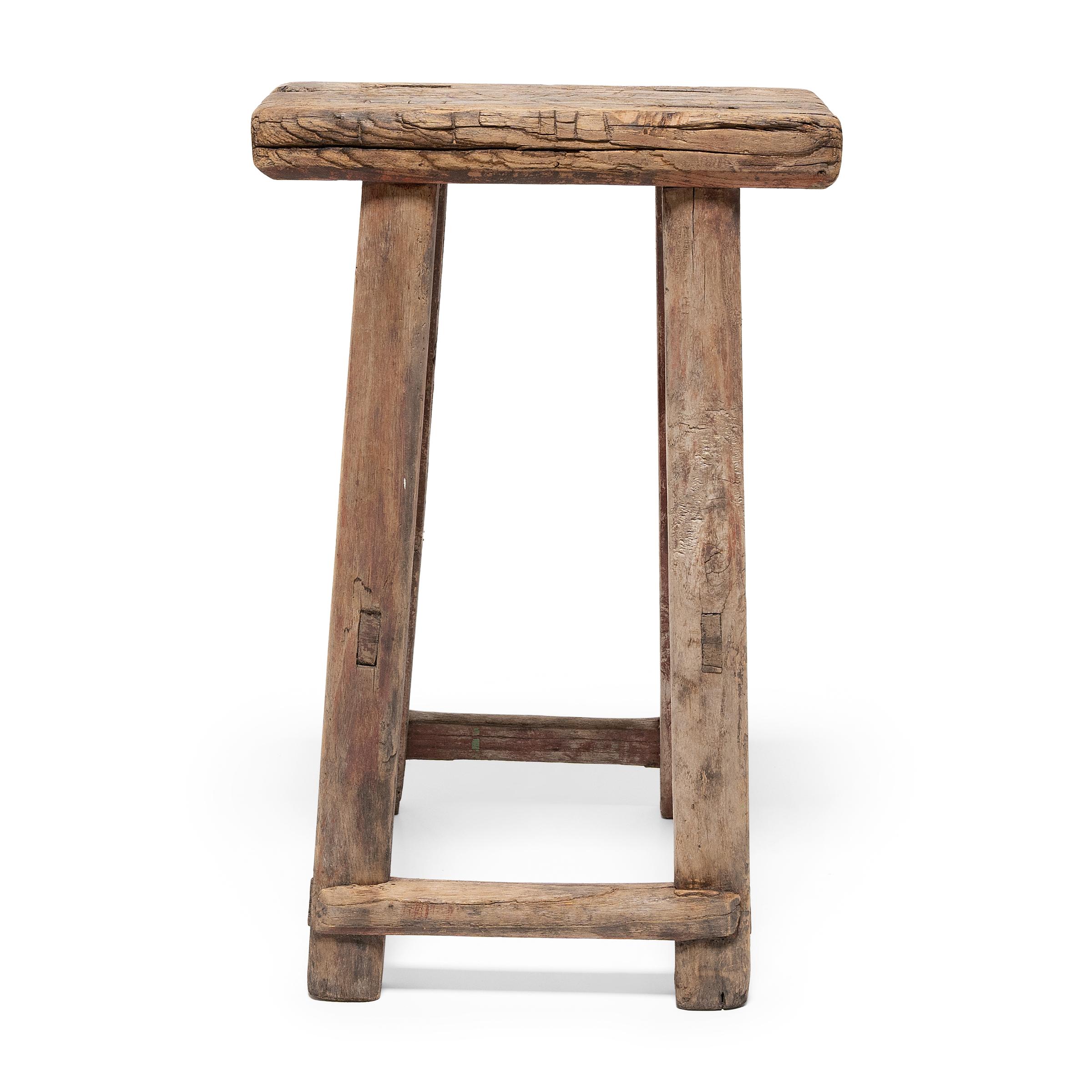 More portable than chairs, stools were a versatile seating option for Qing-dynasty scholars, nobles, and peasants alike. The balanced proportions of this tapered stool from China's Shanxi province show us how masterfully traditional carpenters