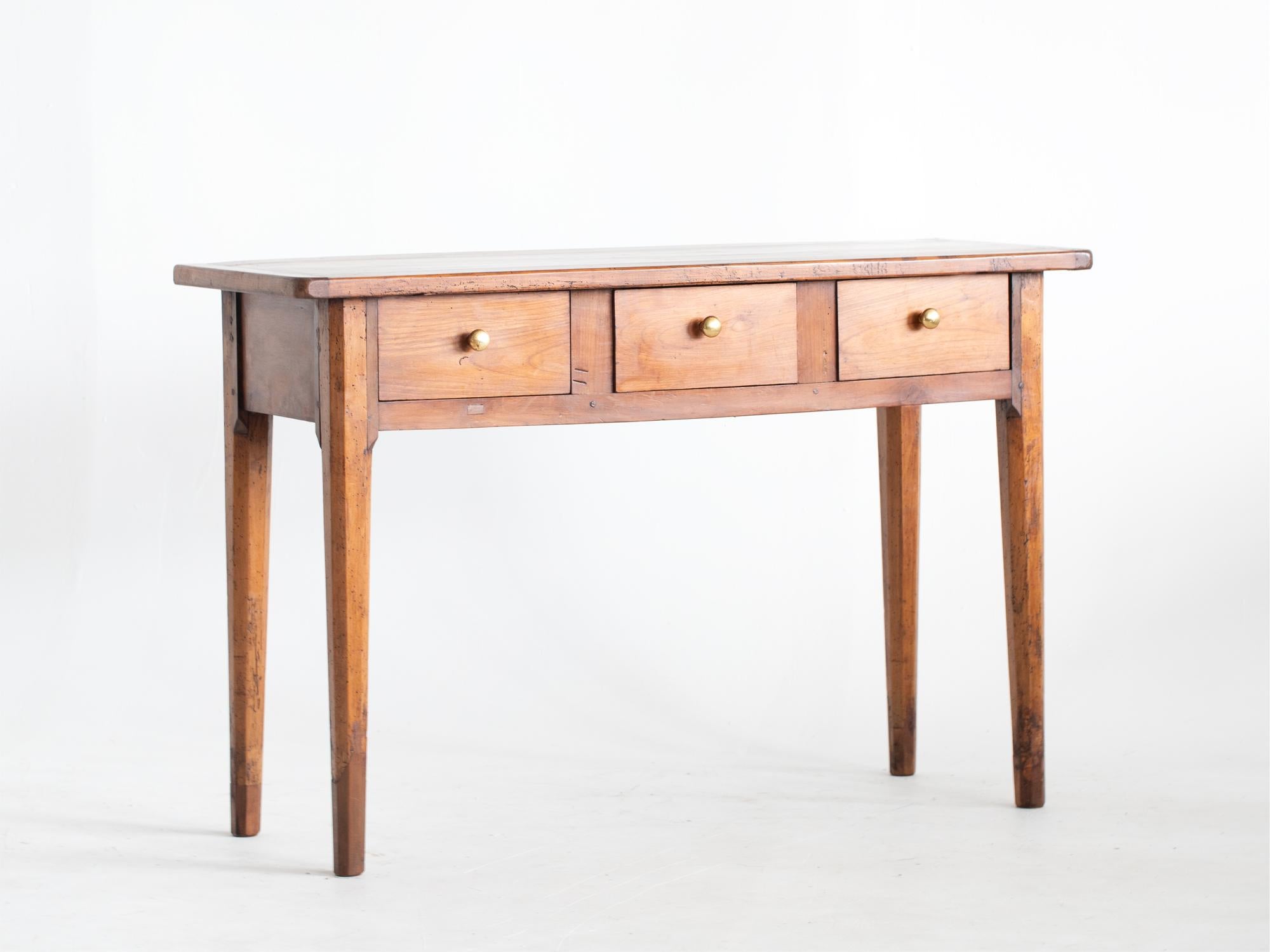 A three-drawer cherrywood serving table or console adapted from a larger antique French farmhouse table.

Stock ref. #2204

In good sturdy order. Beautiful colour and wear to the timber.

77.5 x 119.5 x 42.5 cm

30.5 x 47.0 x 16.7 