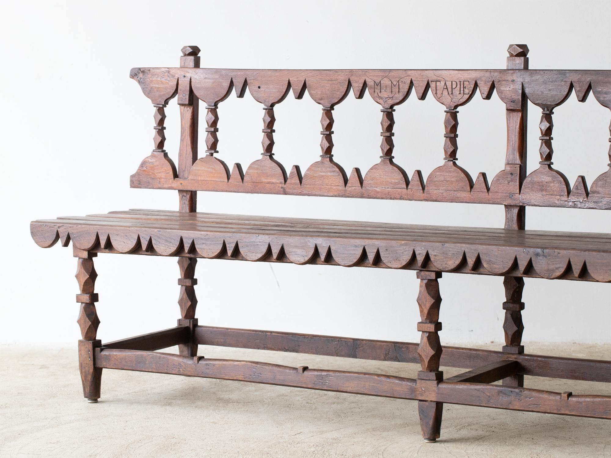 A provincial oak marriage bench engraved Monsieur & Madame Tapie. French Alps, c. 1830s.

Stock ref. #2241

In good sturdy order with minor repairs.

90.5 x 230 x 53 cm (35.6 x 90.6 x 20.9 