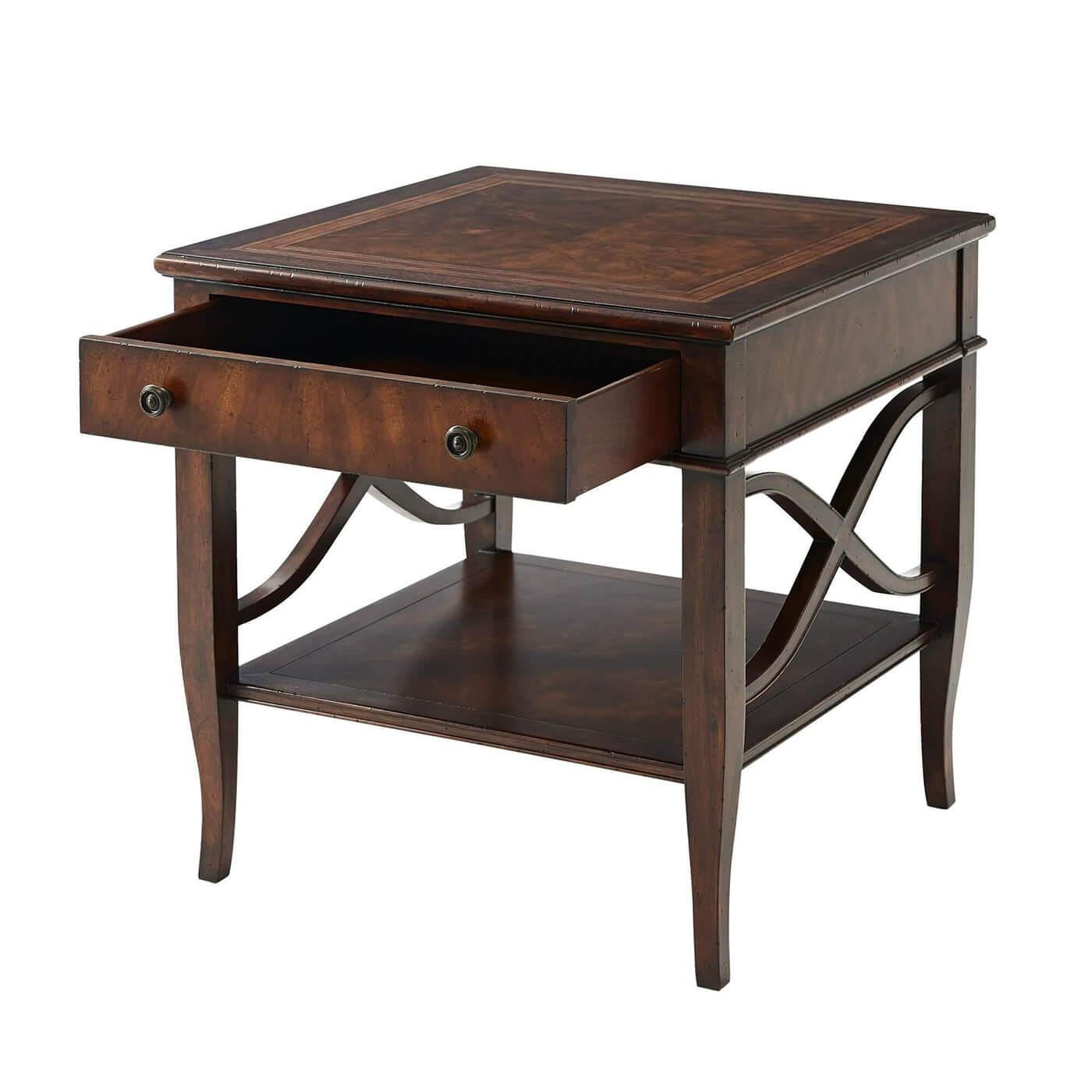 An Italian neo classic mahogany crossbanded side table, the square top above a frieze drawer, on square and splayed legs joined by an under tier and with wavy 'X' side stretchers. 

Dimensions: 26