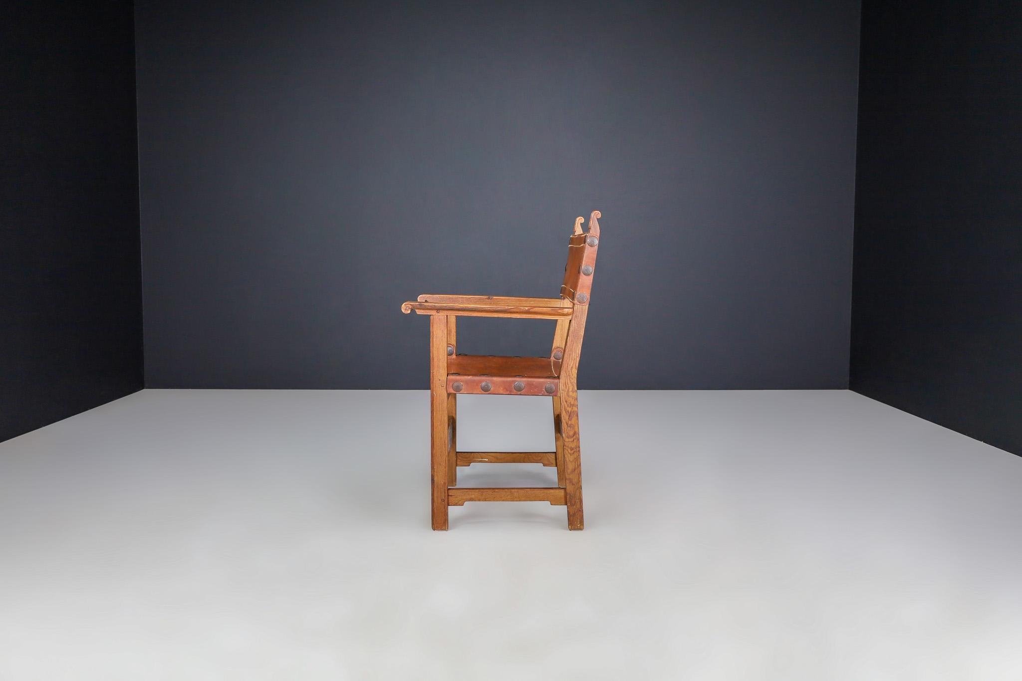 Mid-20th Century Provincial Mid-Century Armchairs in Patinated Cognac Saddle Leather, France 1950 For Sale