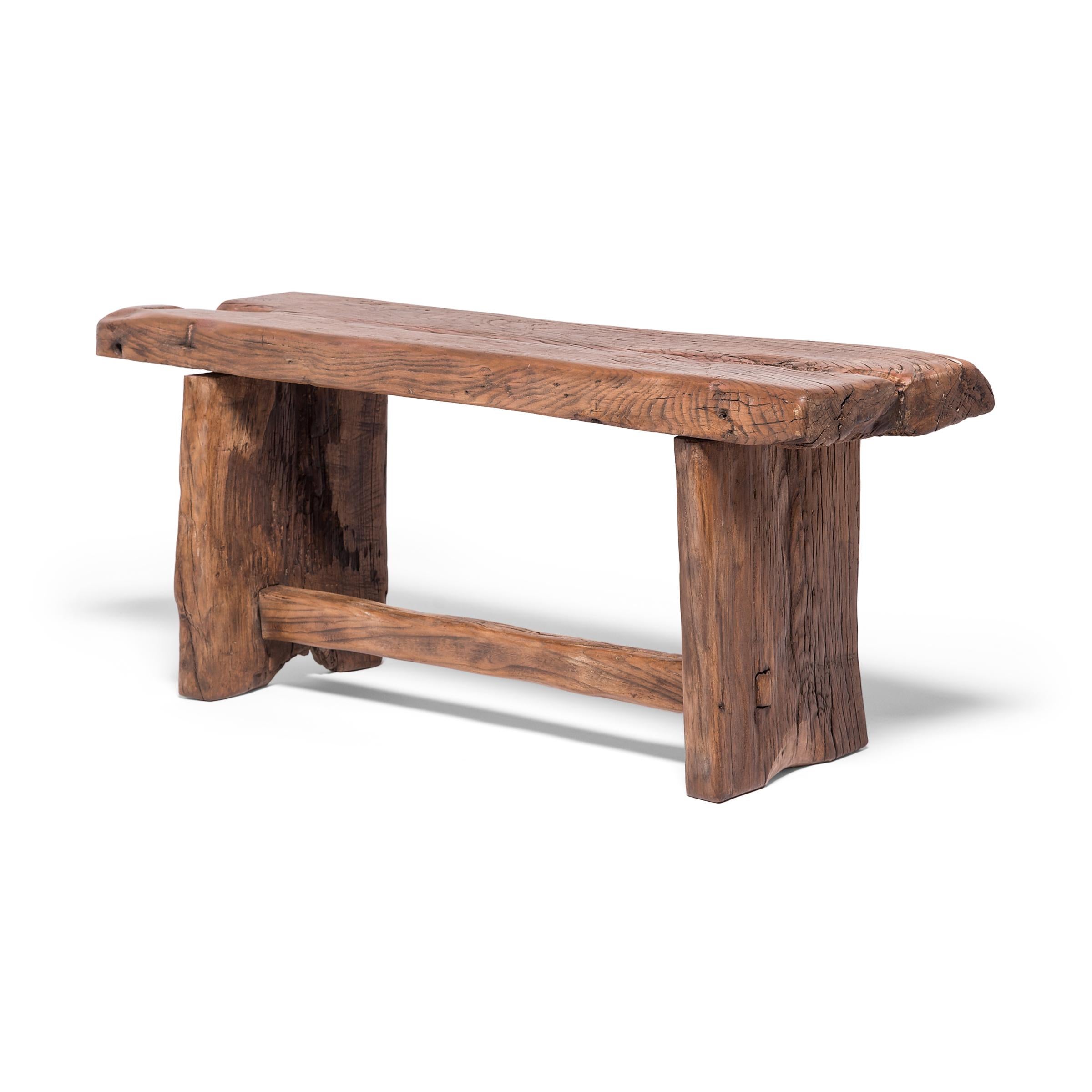 Made of wood reclaimed from 18th century Chinese buildings, this contemporary bench honours the material with clean lines and minimal ornamentation. Skilled in traditional joinery techniques, our craftspeople have fashioned a simple provincial bench