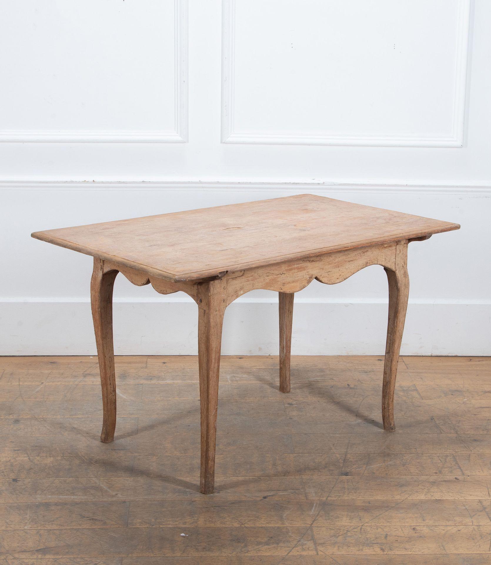 Beautiful late 18th Century provincial Swedish Rococo table.
Freestanding, with scalloped carved frieze to all sides and resting on cabriole legs.
Washed back to original colour.
Circa 1790.