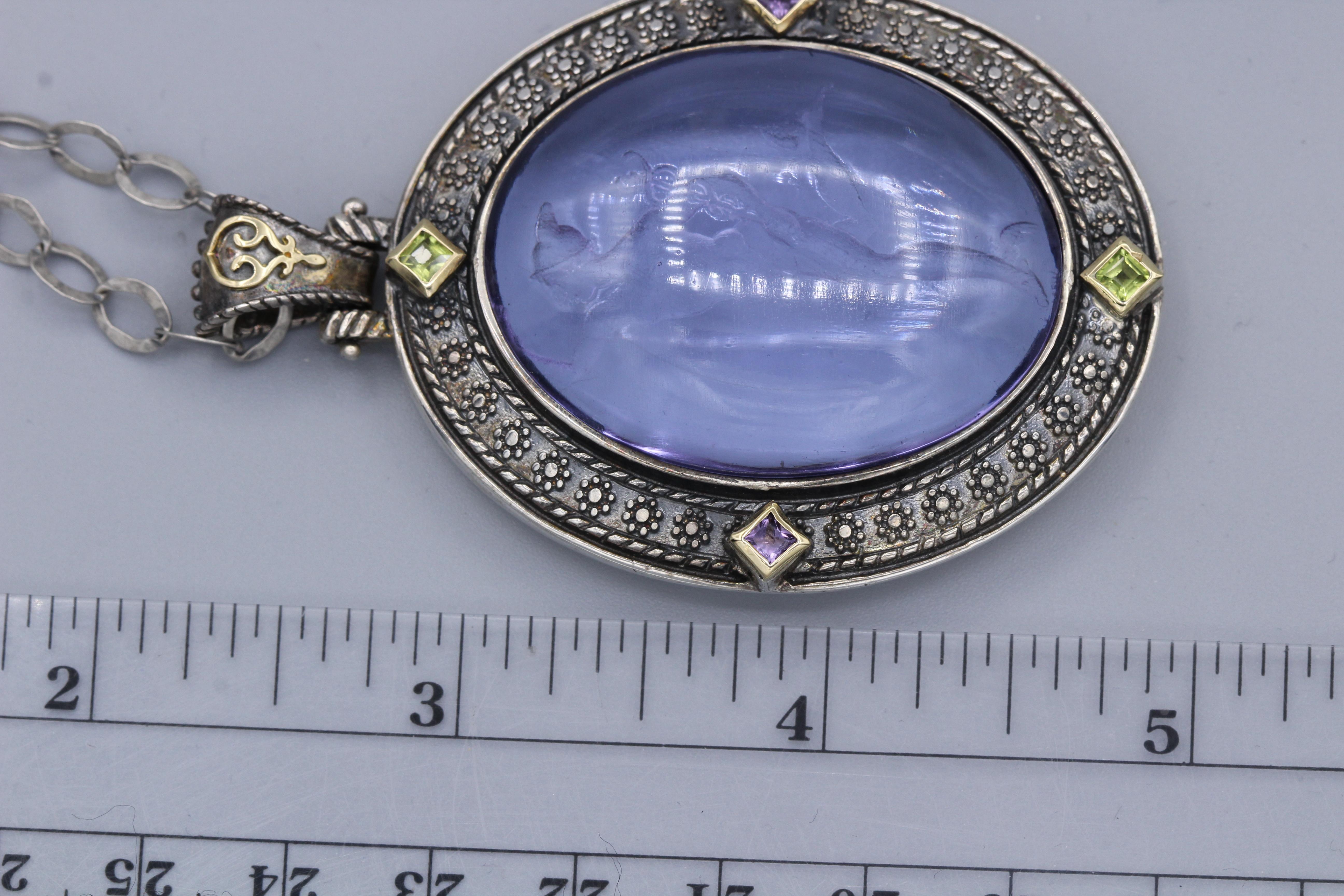 Venetian Purple Murano Glass Antique / Gothic Style Pendant
Image of Ermes - the messanger of Gods fortunes wealth & athletes
Sterling Silver 925, 48 Grams, 
with small natural Amethyst & Peridot stones,
set with 18K Yellow Gold Ornaments, 
Pendant