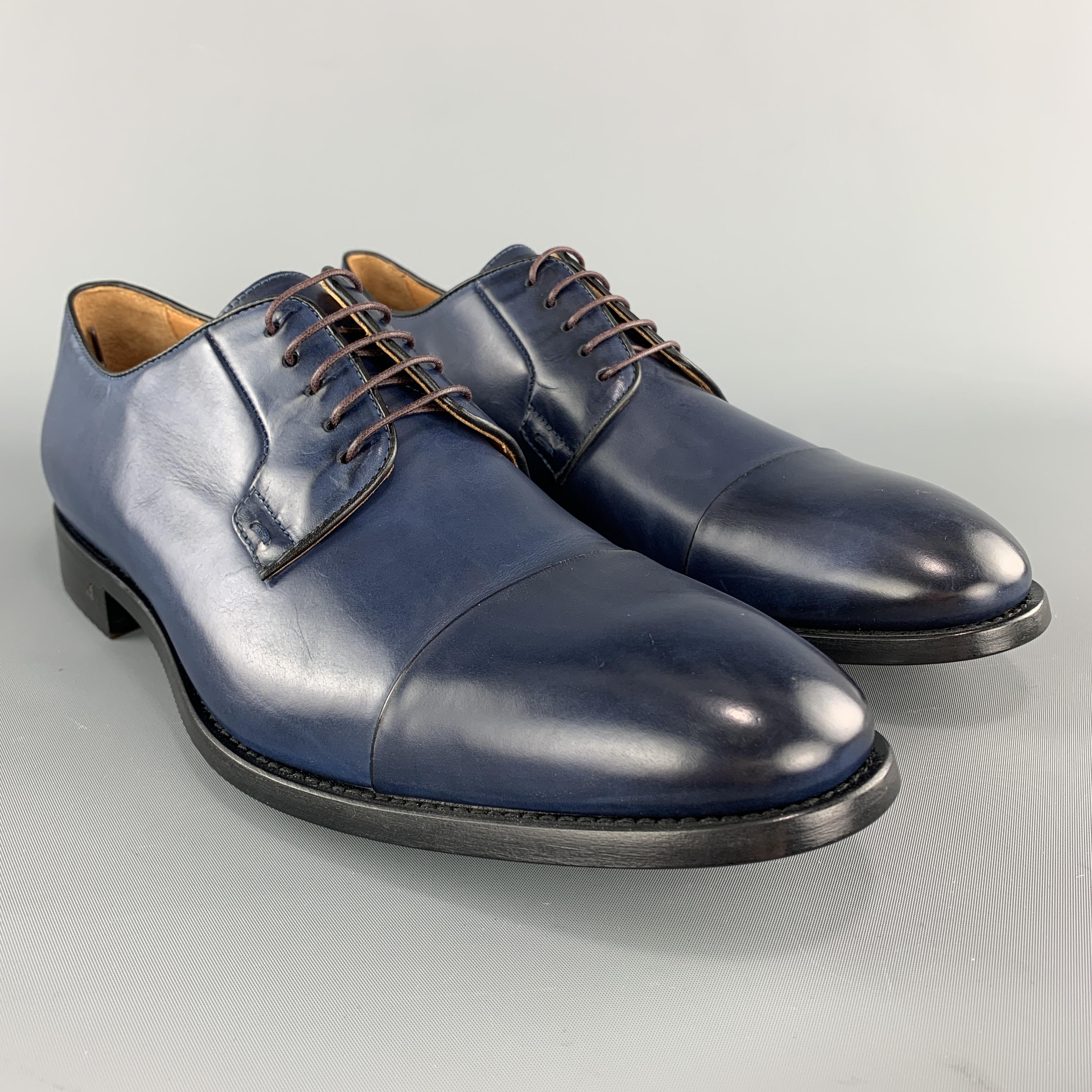 PS by PAUL SMITH dress shoes come in navy blue antique effect leather with a cap toe. Made in Italy.

Brand New.
Marked: UK 10

Outsole: 12.25 x 4.5 in.