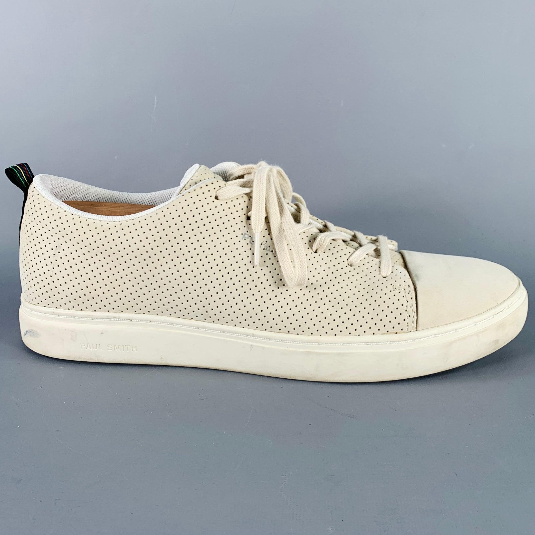 PS by PAUL SMITH sneakers
in a stone grey leather featuring a perforated design, suede cap toe, and lace-up closure. Shoe trees not included.
Comes with dust bag.Good Pre- Owned Condition.
Moderate marks, as is. 

Marked:   EU 45Outsole: 12 inches 