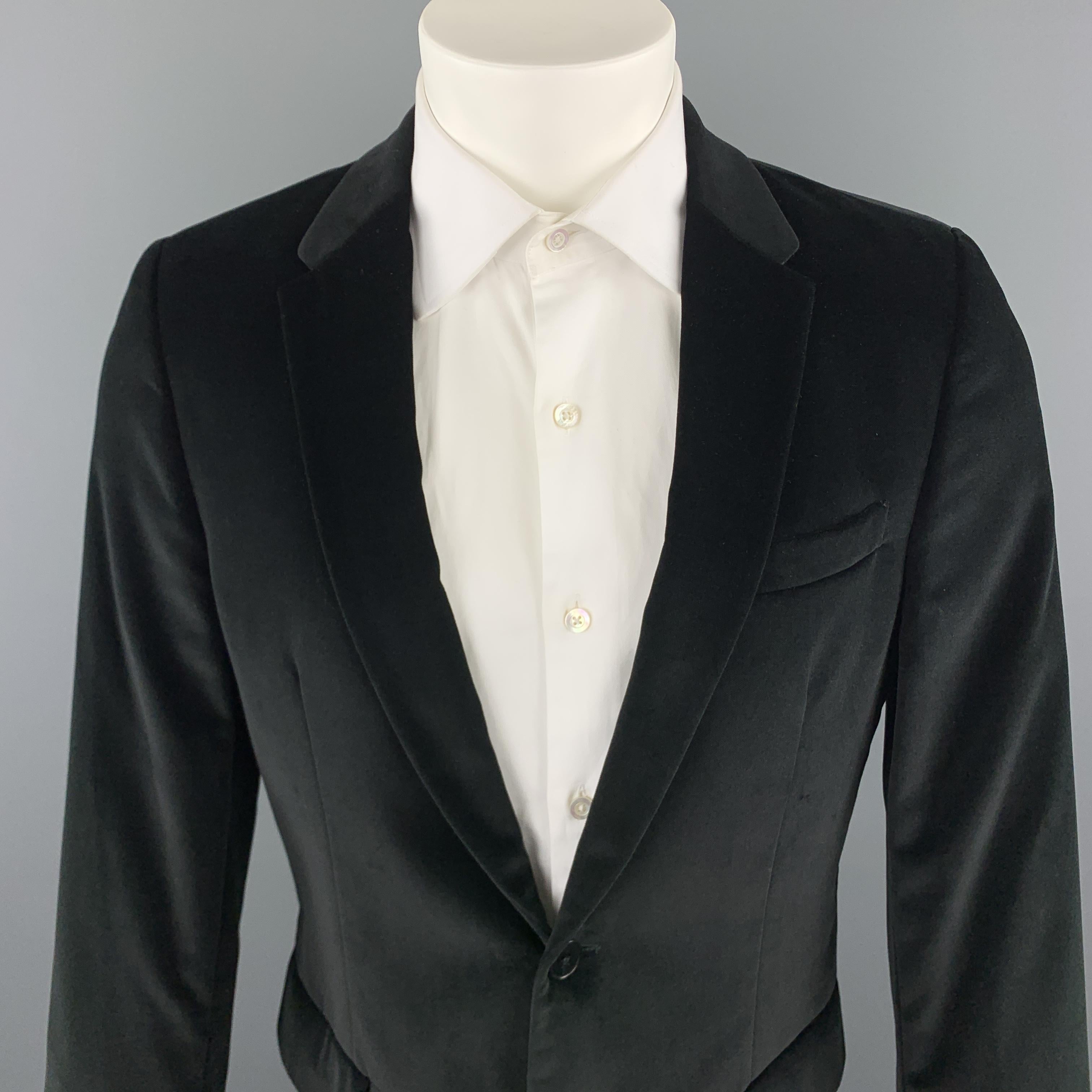 PS by PAUL SMITH sport coat comes in a solid black velvet material, featuring a notch lapel, two buttons at closure, buttoned  cuffs, and a double vent at back. Made in Portugal.

Excellent Pre-Owned Condition.
Marked: